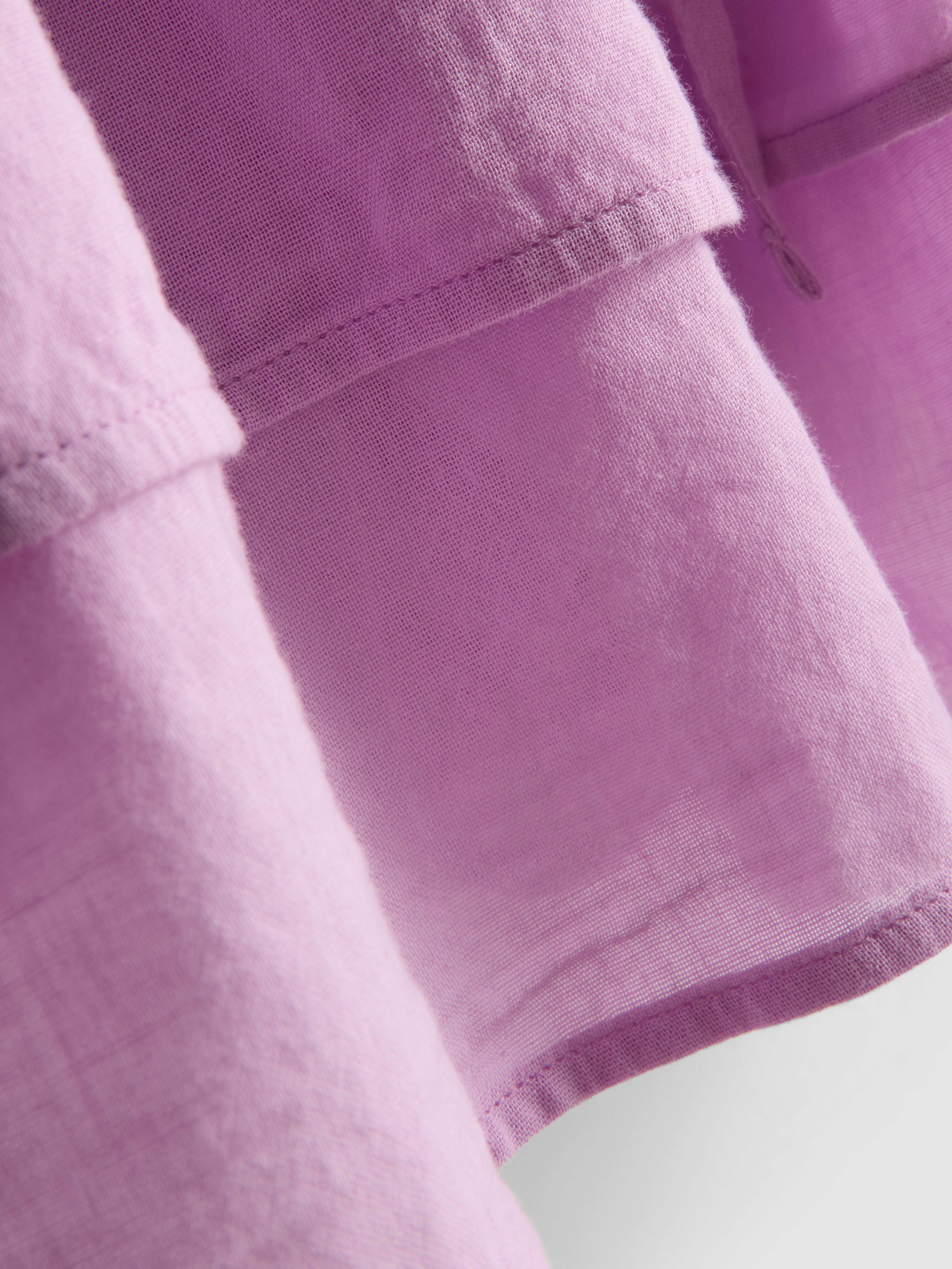 Minigonna in cotone a balze con volant