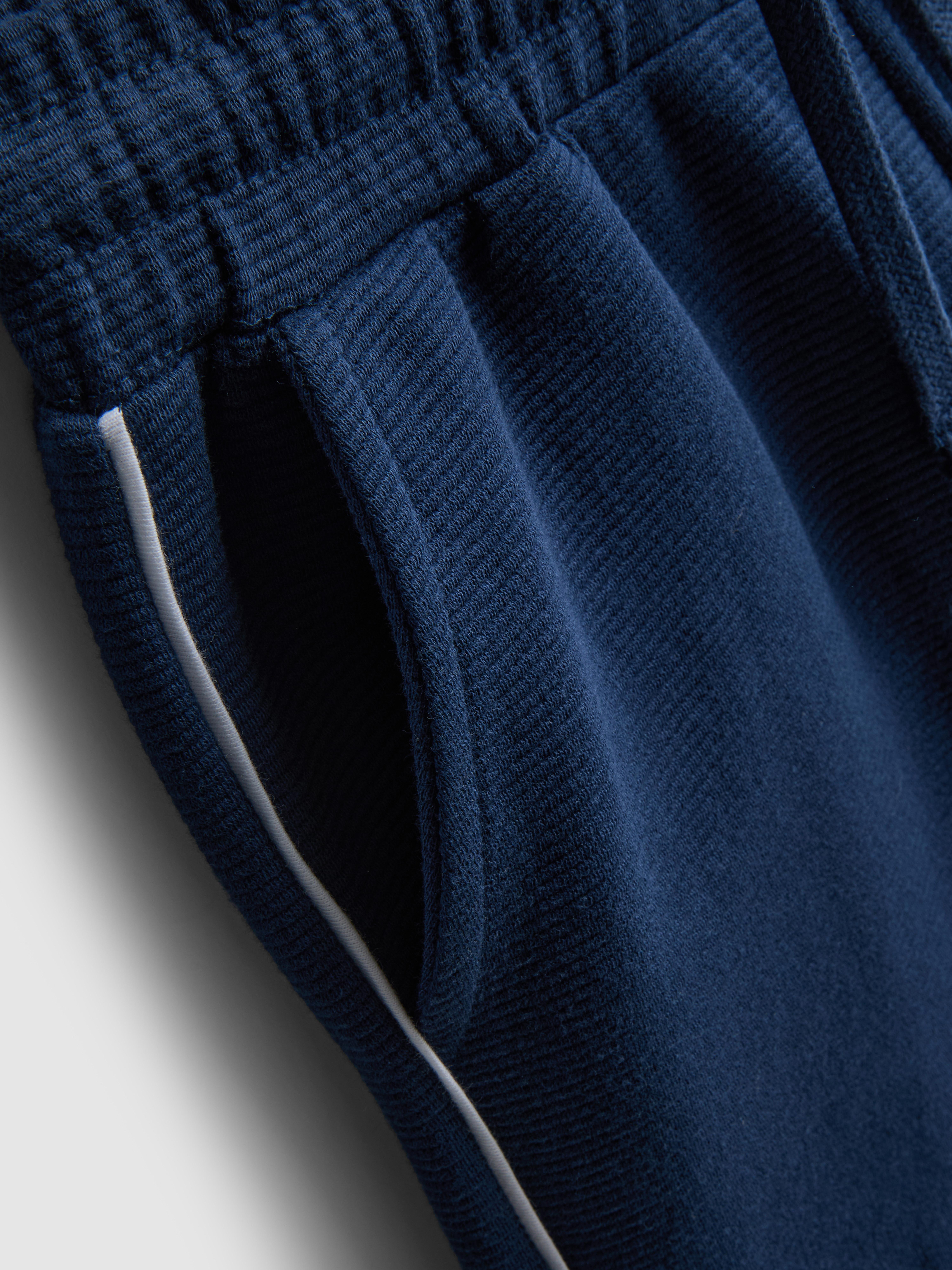 7–15 Jahre | Strukturiertes Poloshirt und Shorts im Set