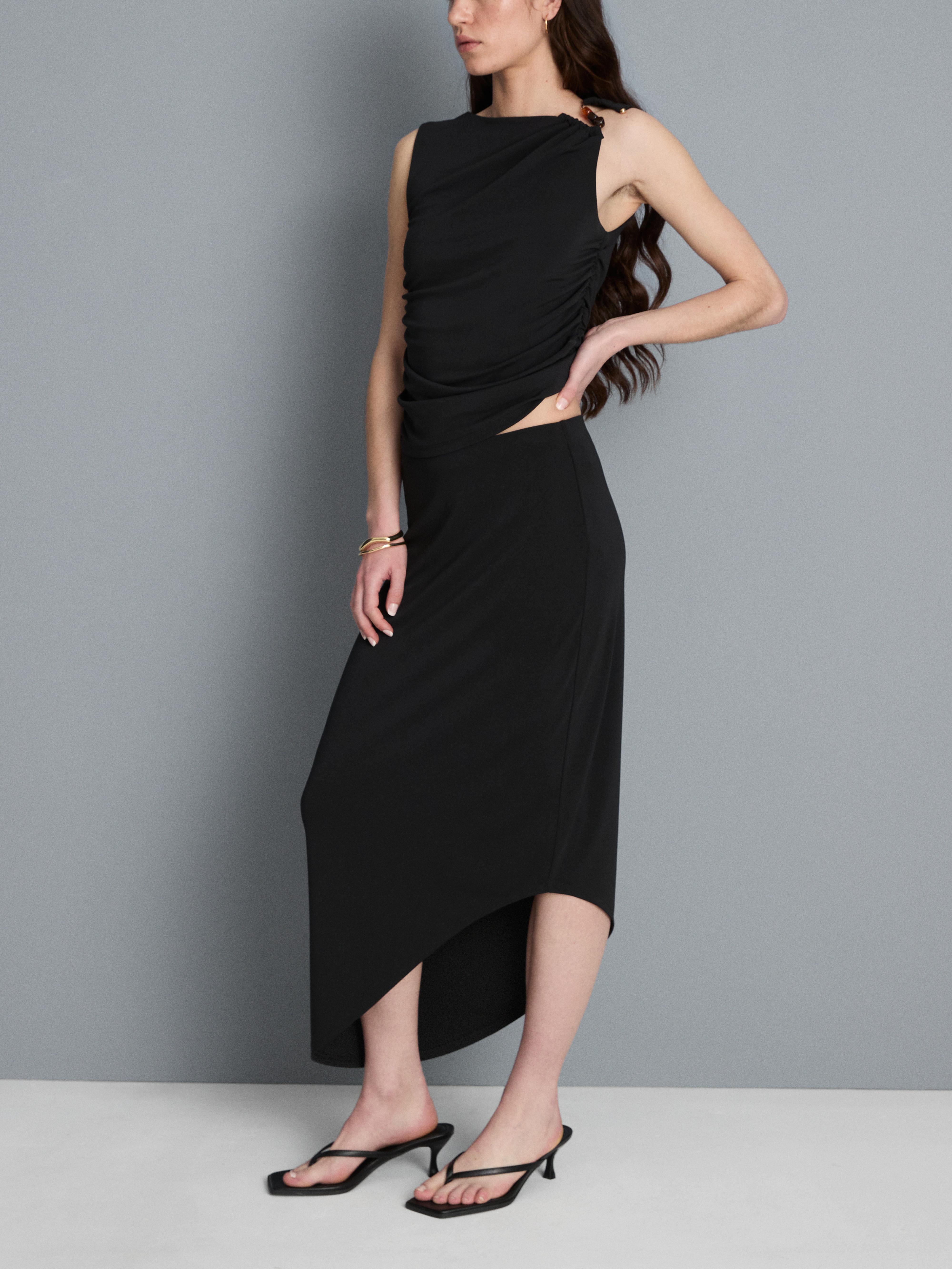 Asymmetrische jersey midirok