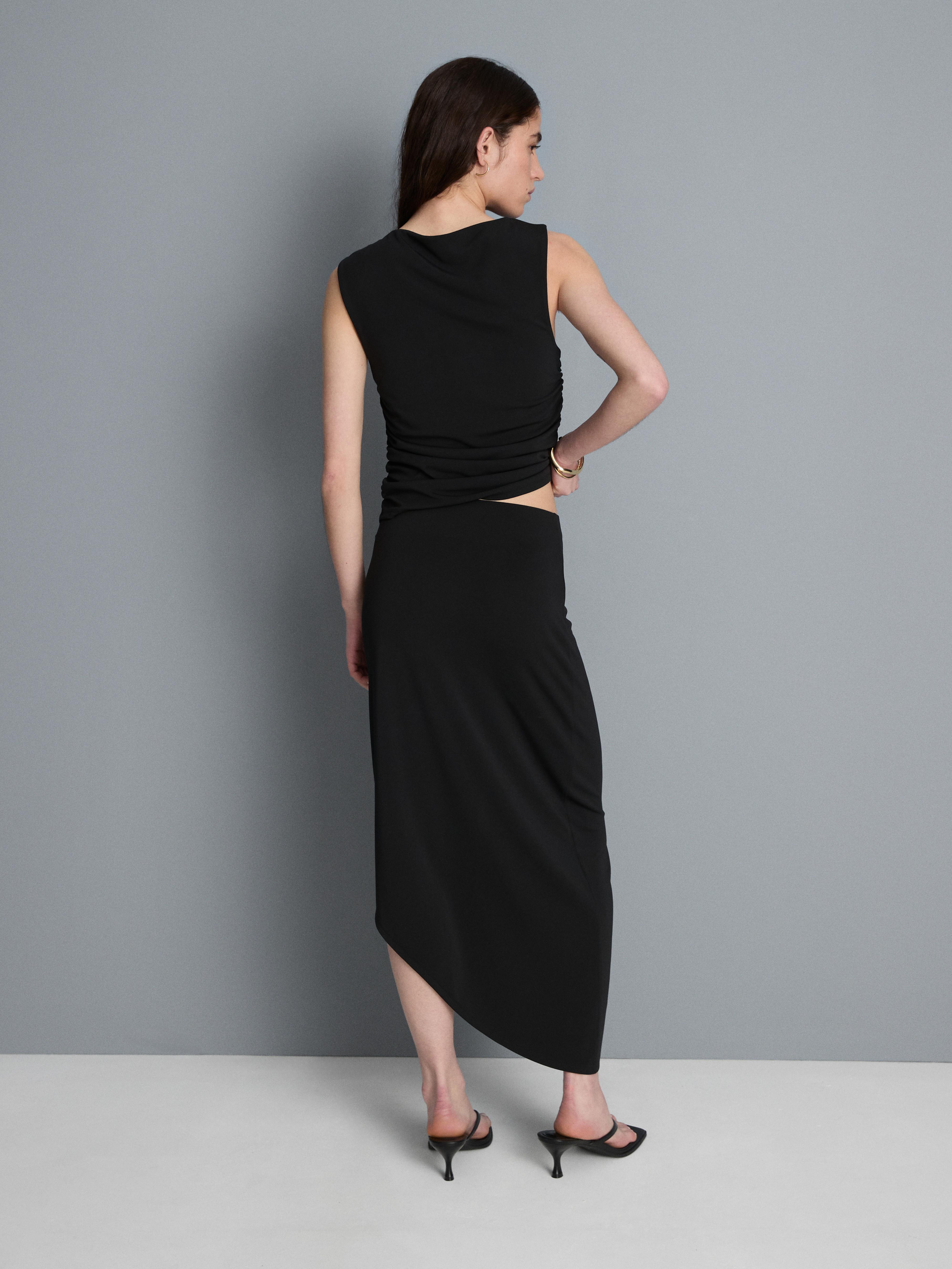 Asymmetrische jersey midirok