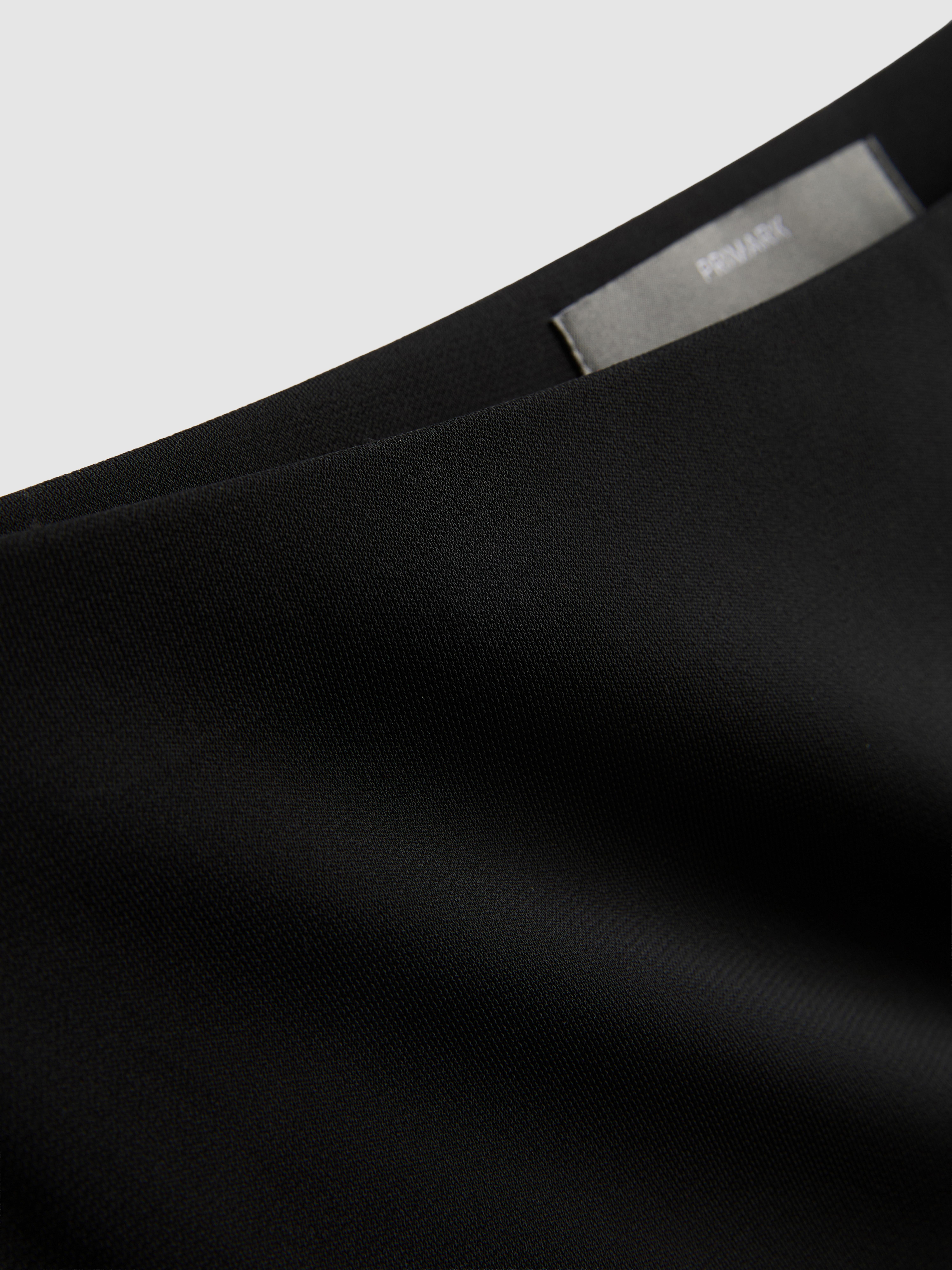 Asymmetrische jersey midirok