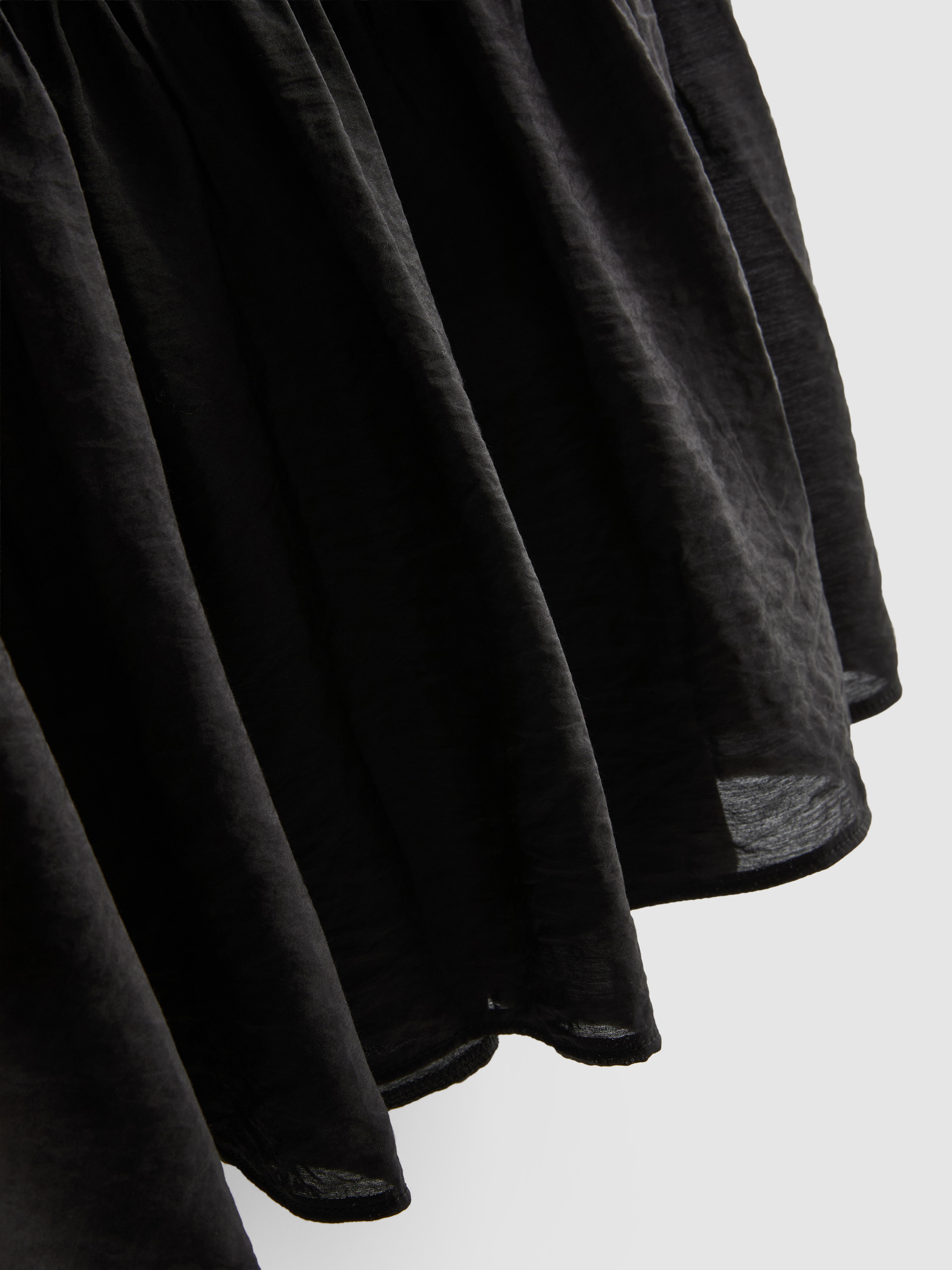 Halflange rok met stroken