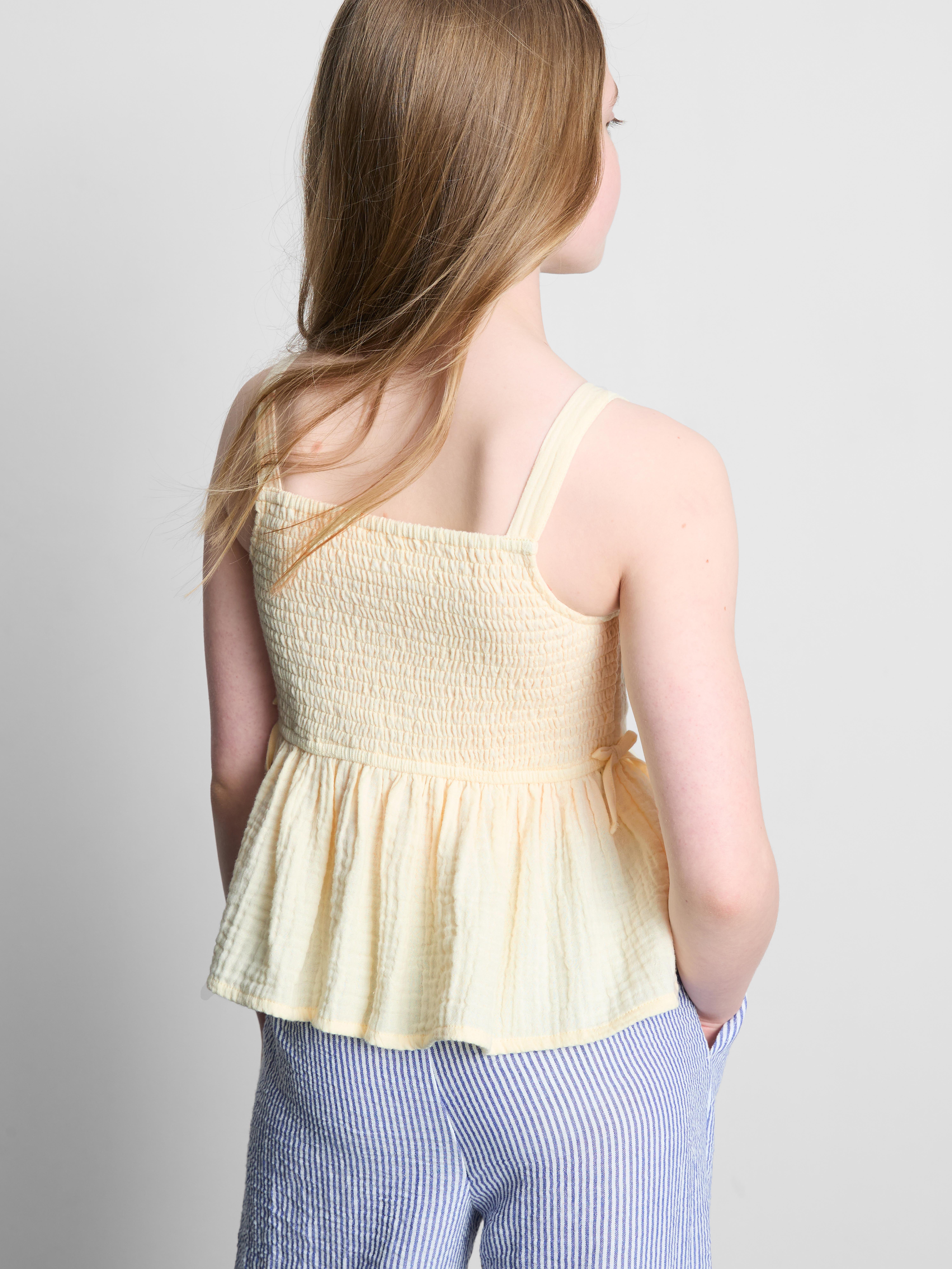 7-15 jr | Blouse met smokwerk en strikjes