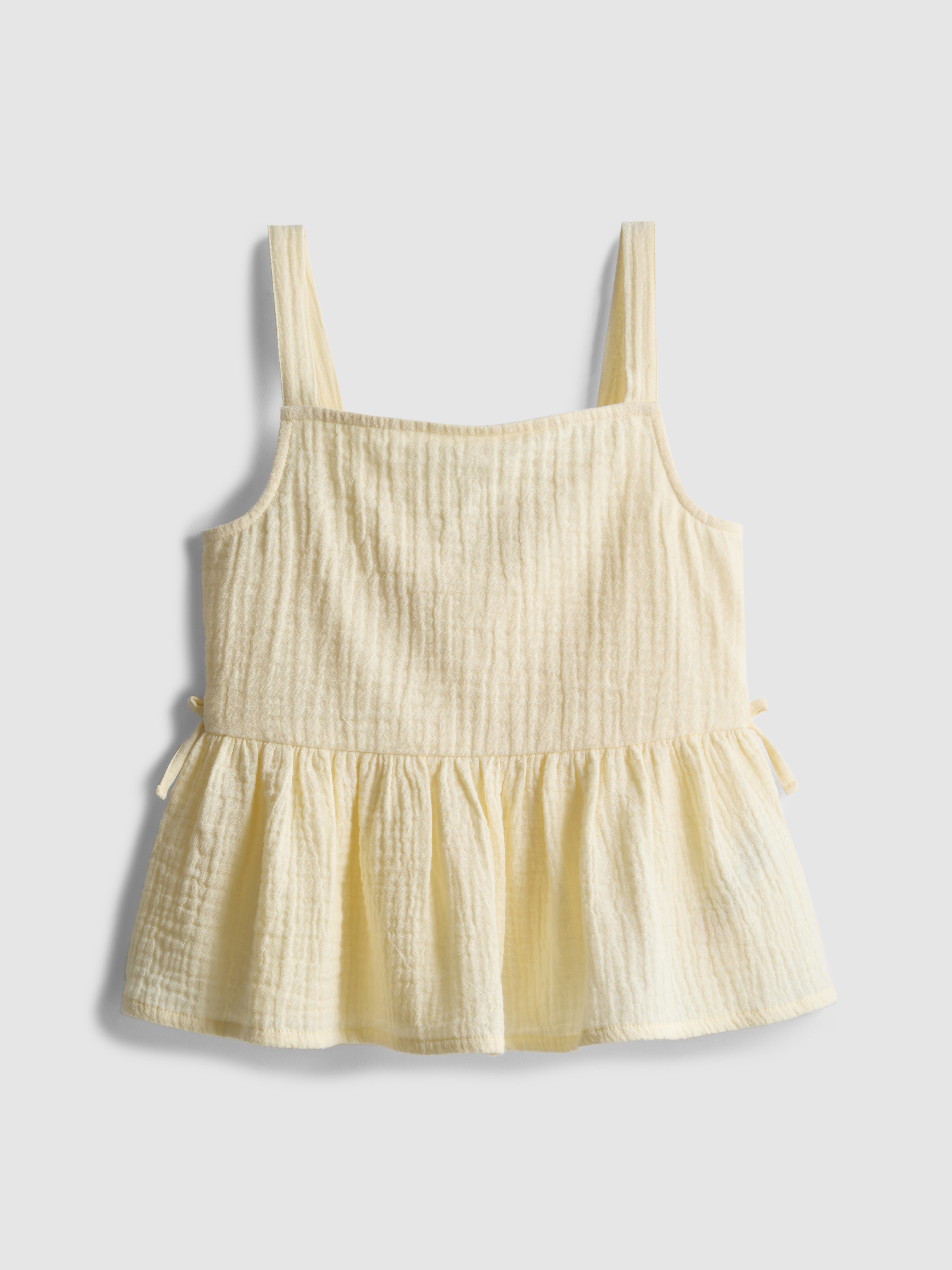 7-15 jr | Blouse met smokwerk en strikjes