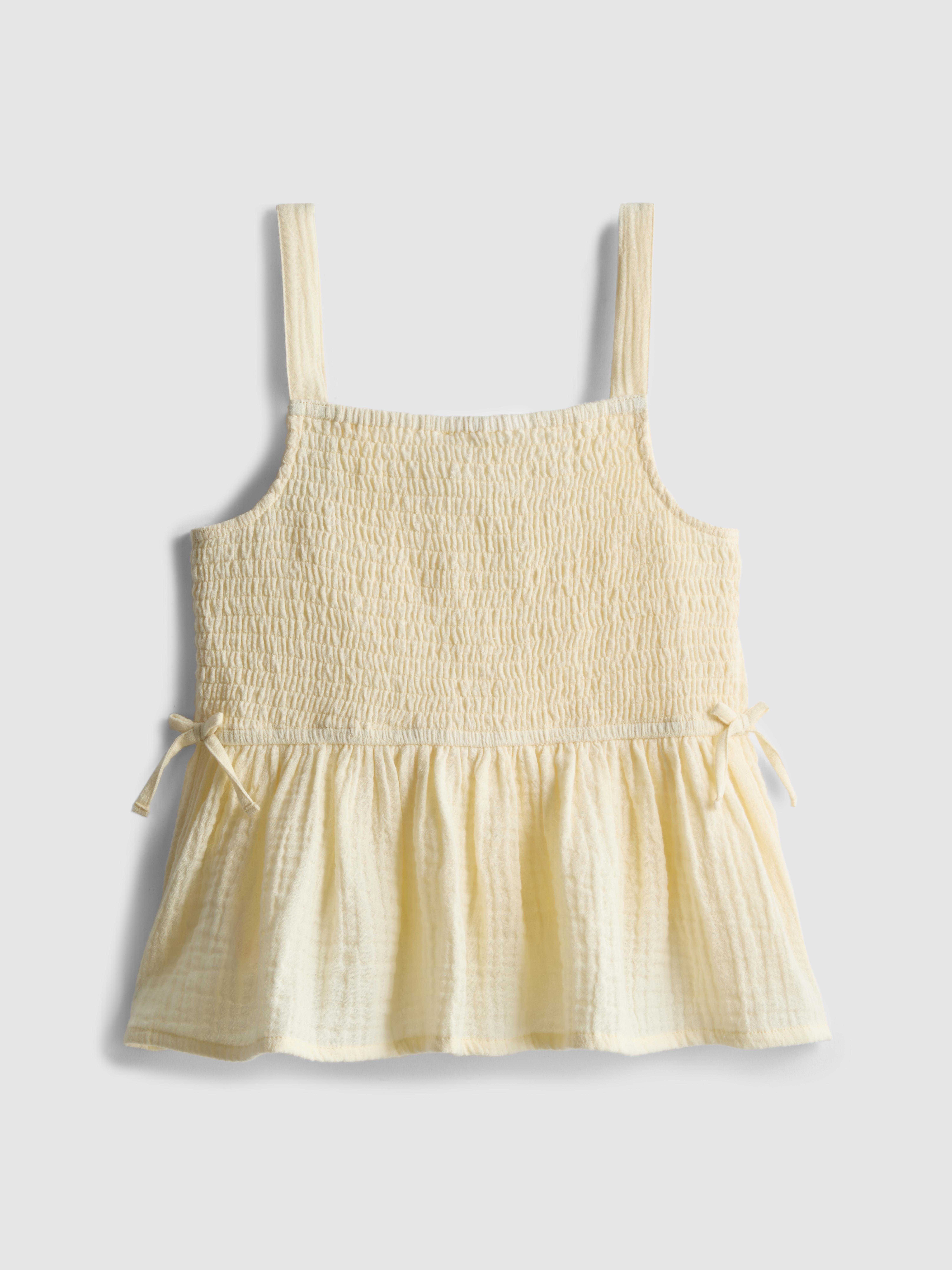 7-15 jr | Blouse met smokwerk en strikjes