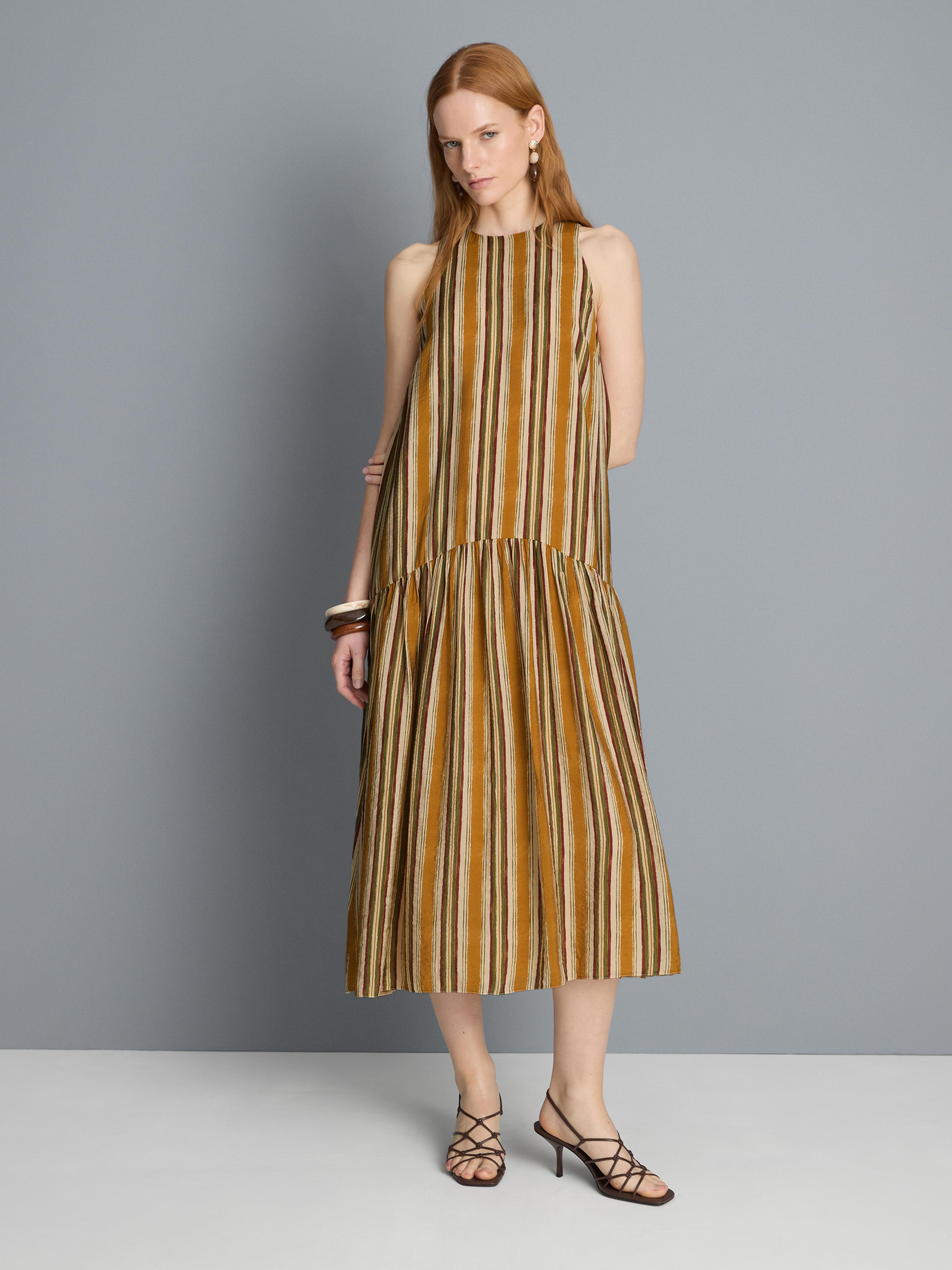 Mouwloze midi-jurk met halternek en print