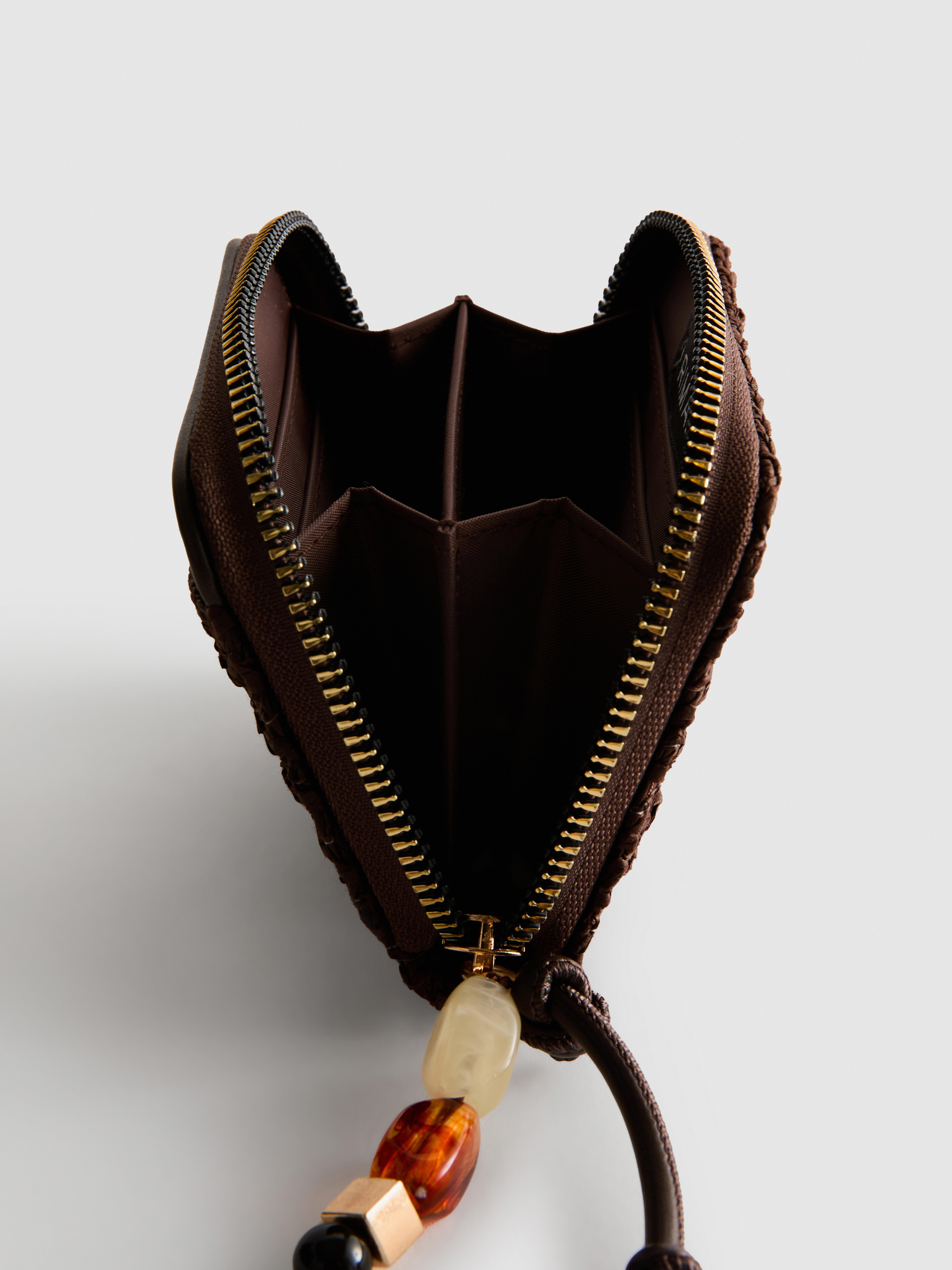 Borsellino con design a trama intrecciata e zip