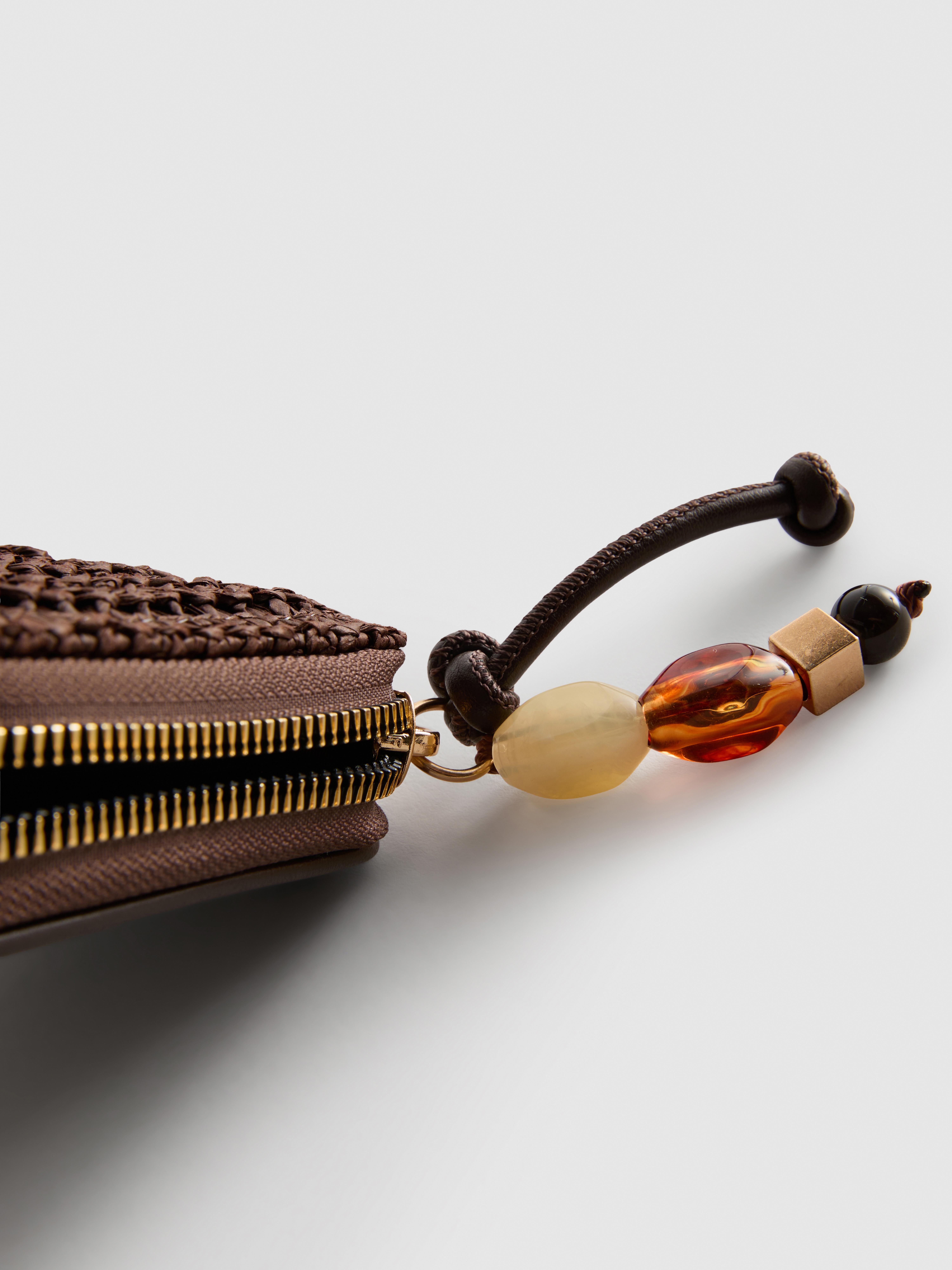 Borsellino con design a trama intrecciata e zip