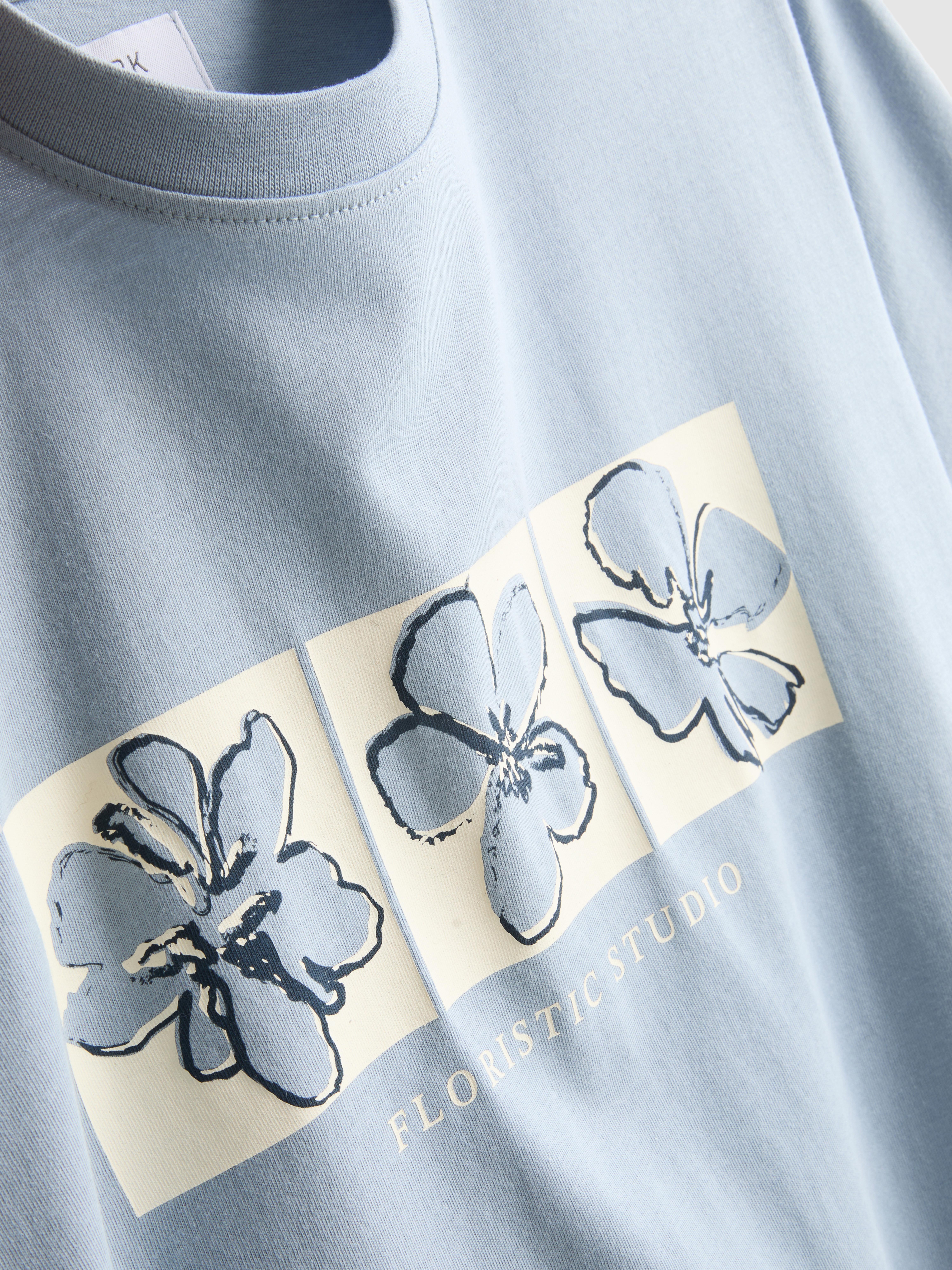 T-shirt gráfico padrão floral
