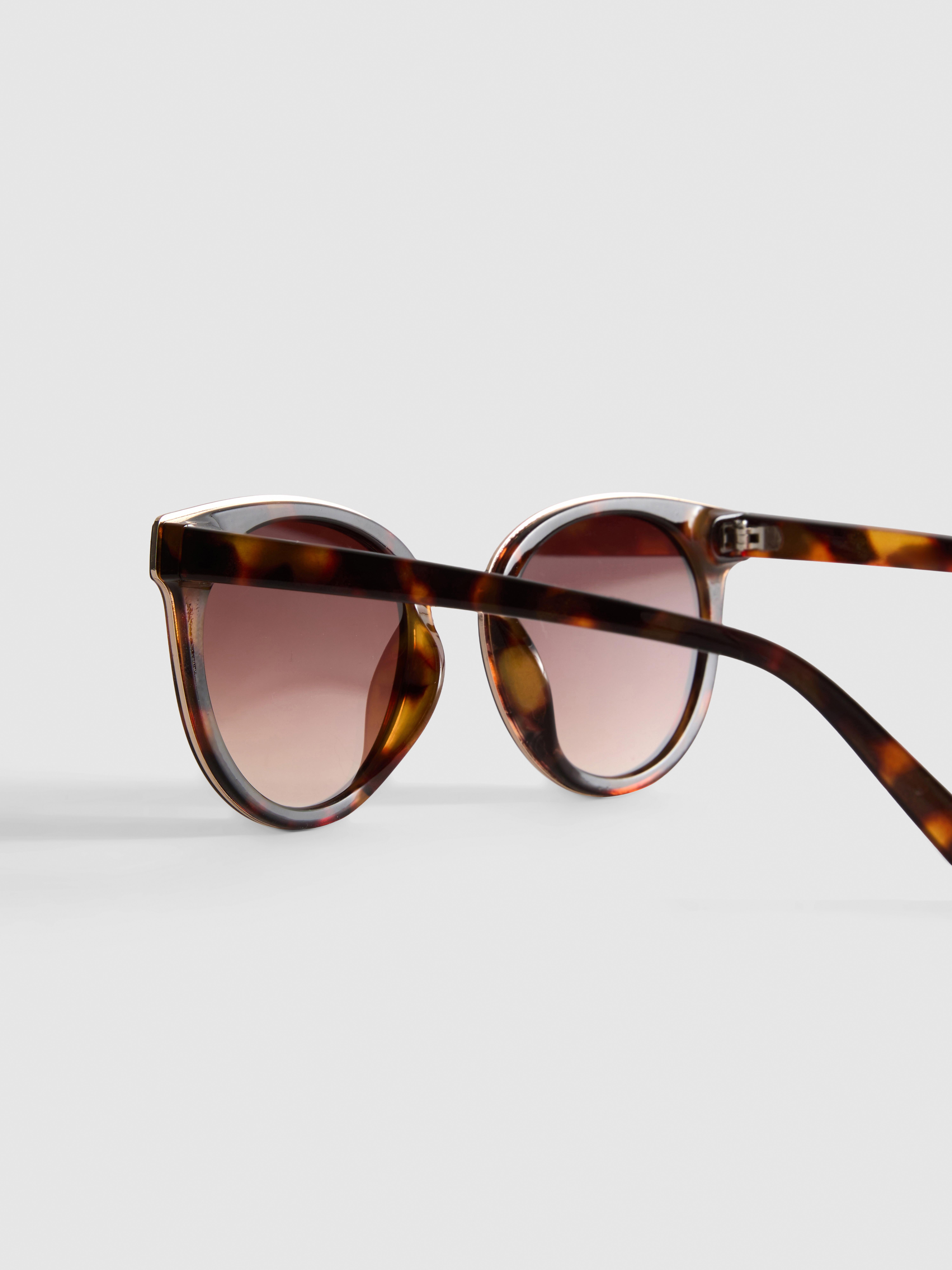 Lunettes de soleil œil-de-chat à barre transversale