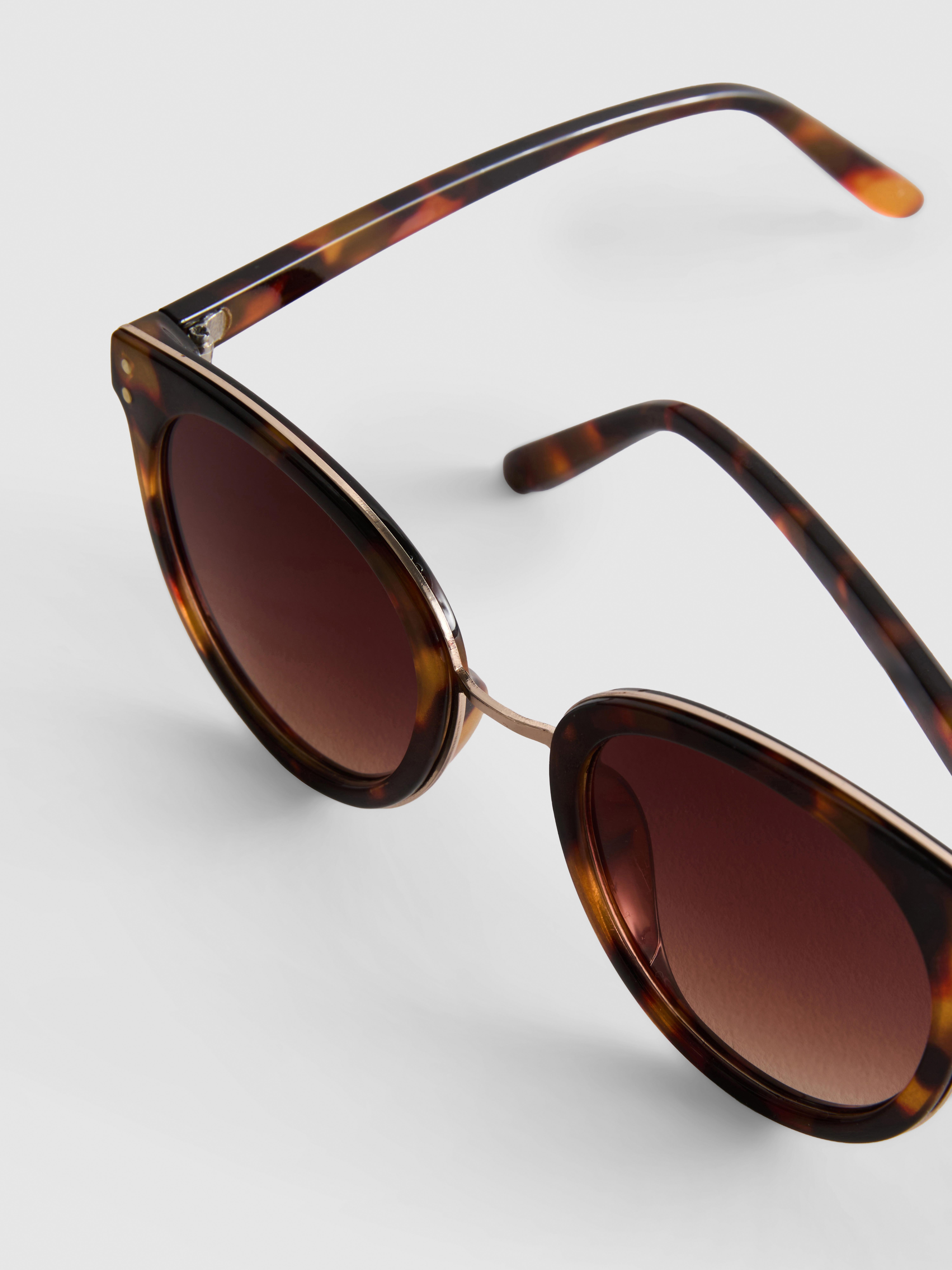 Lunettes de soleil œil-de-chat à barre transversale