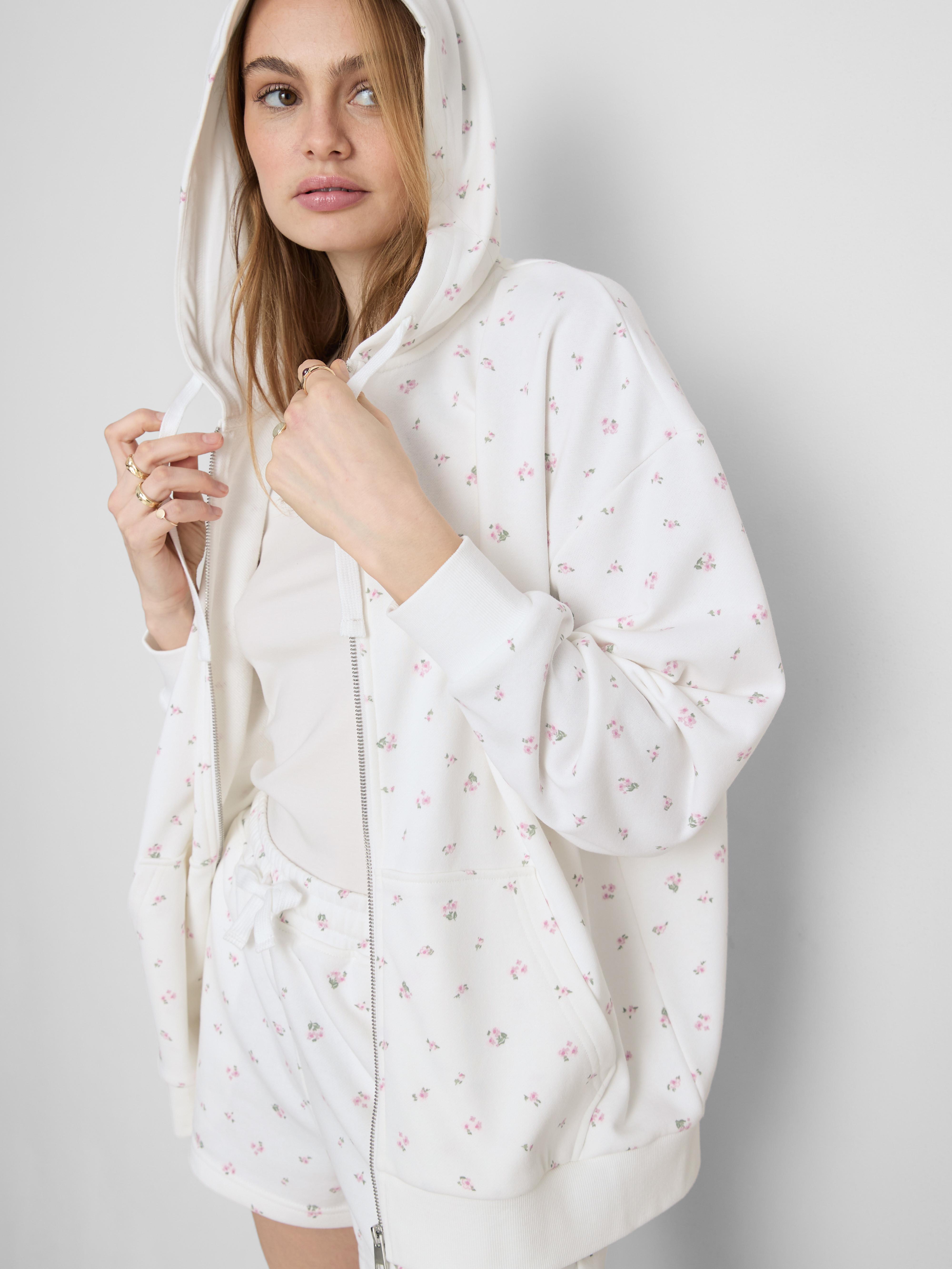 Sweat à capuche zippé en coton majoritaire à fleurs