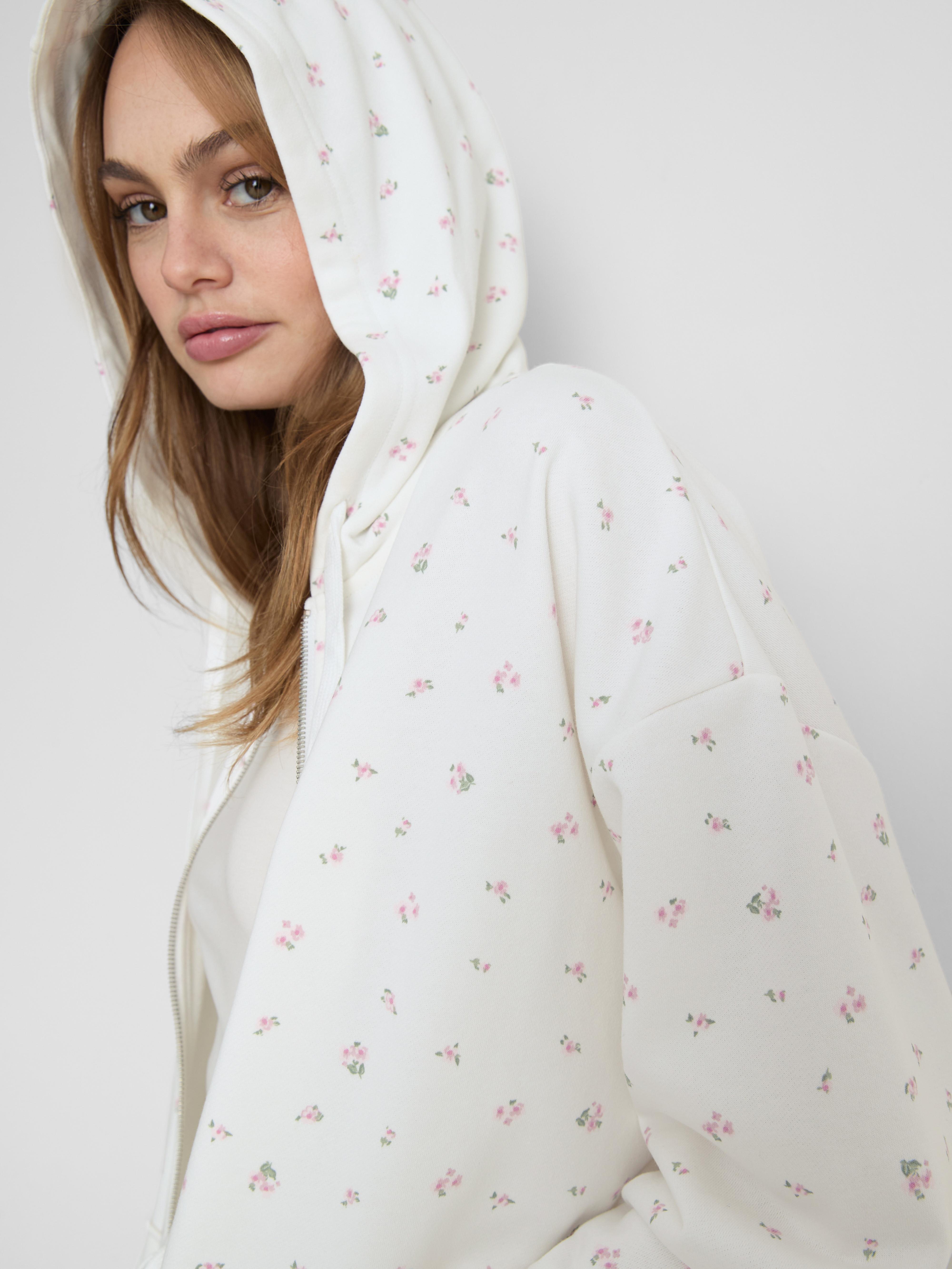 Sweat à capuche zippé en coton majoritaire à fleurs