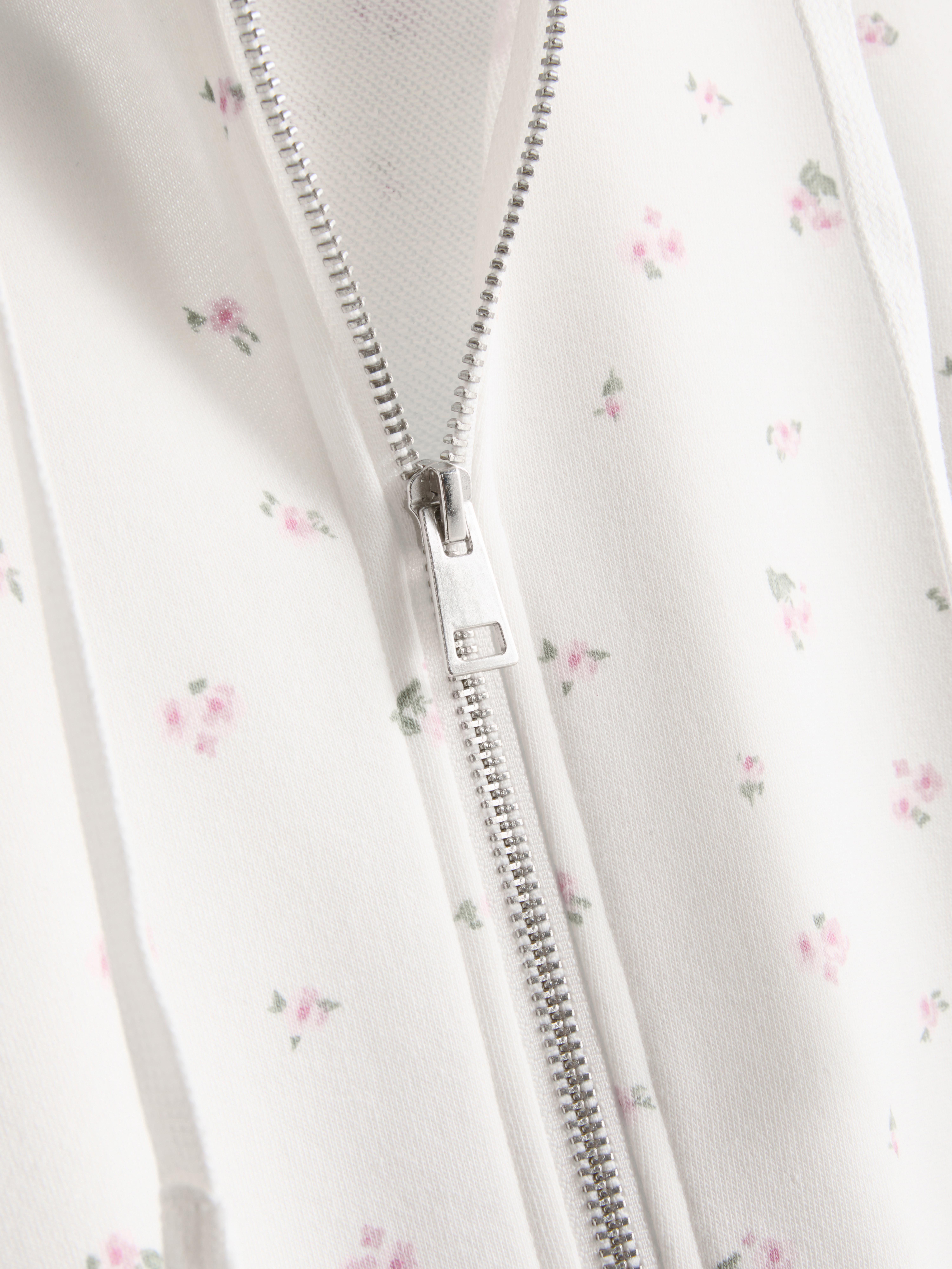Sweat à capuche zippé en coton majoritaire à fleurs