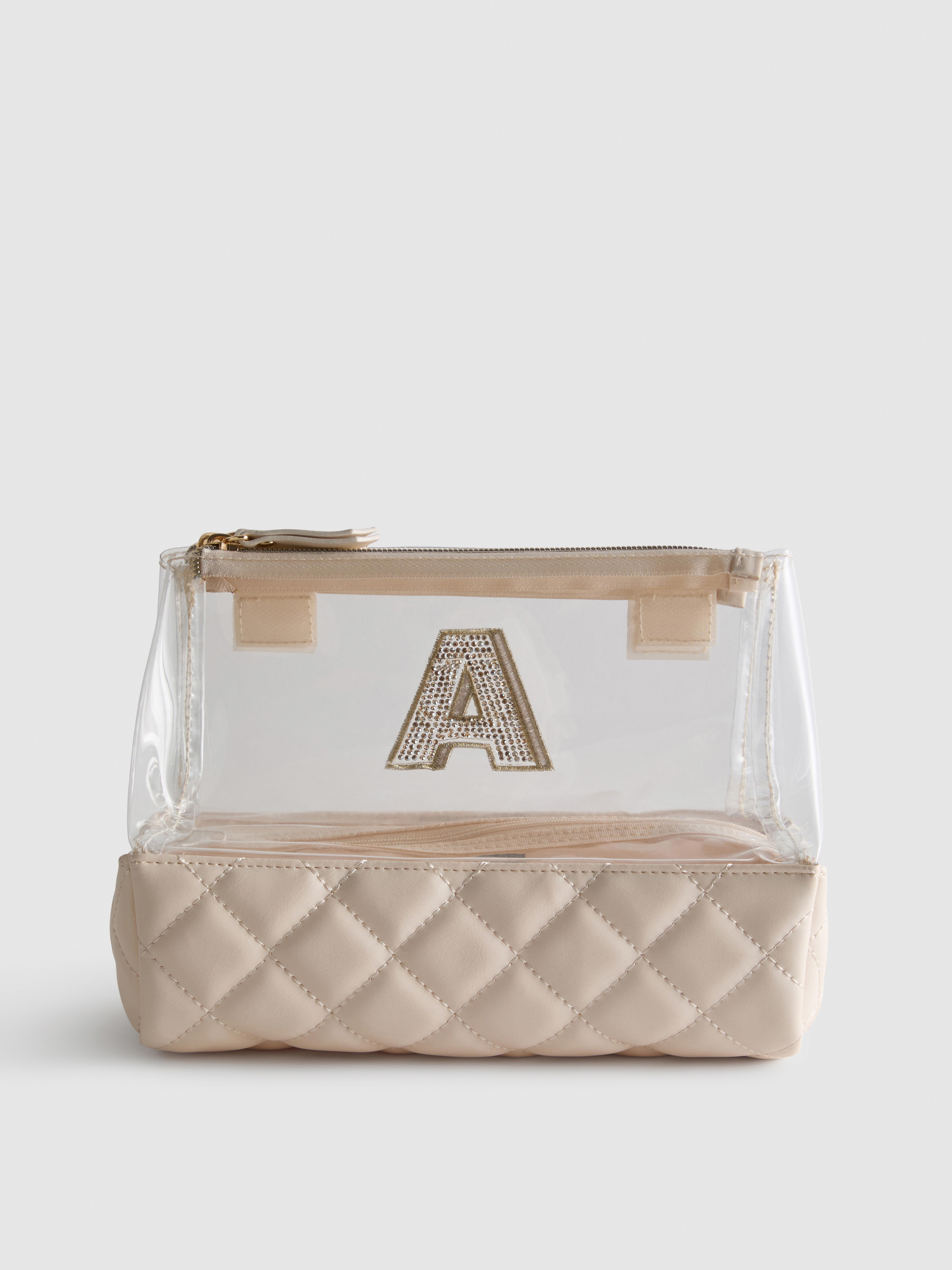 Steppelt, monogramos, háromba hajtható sminktáska