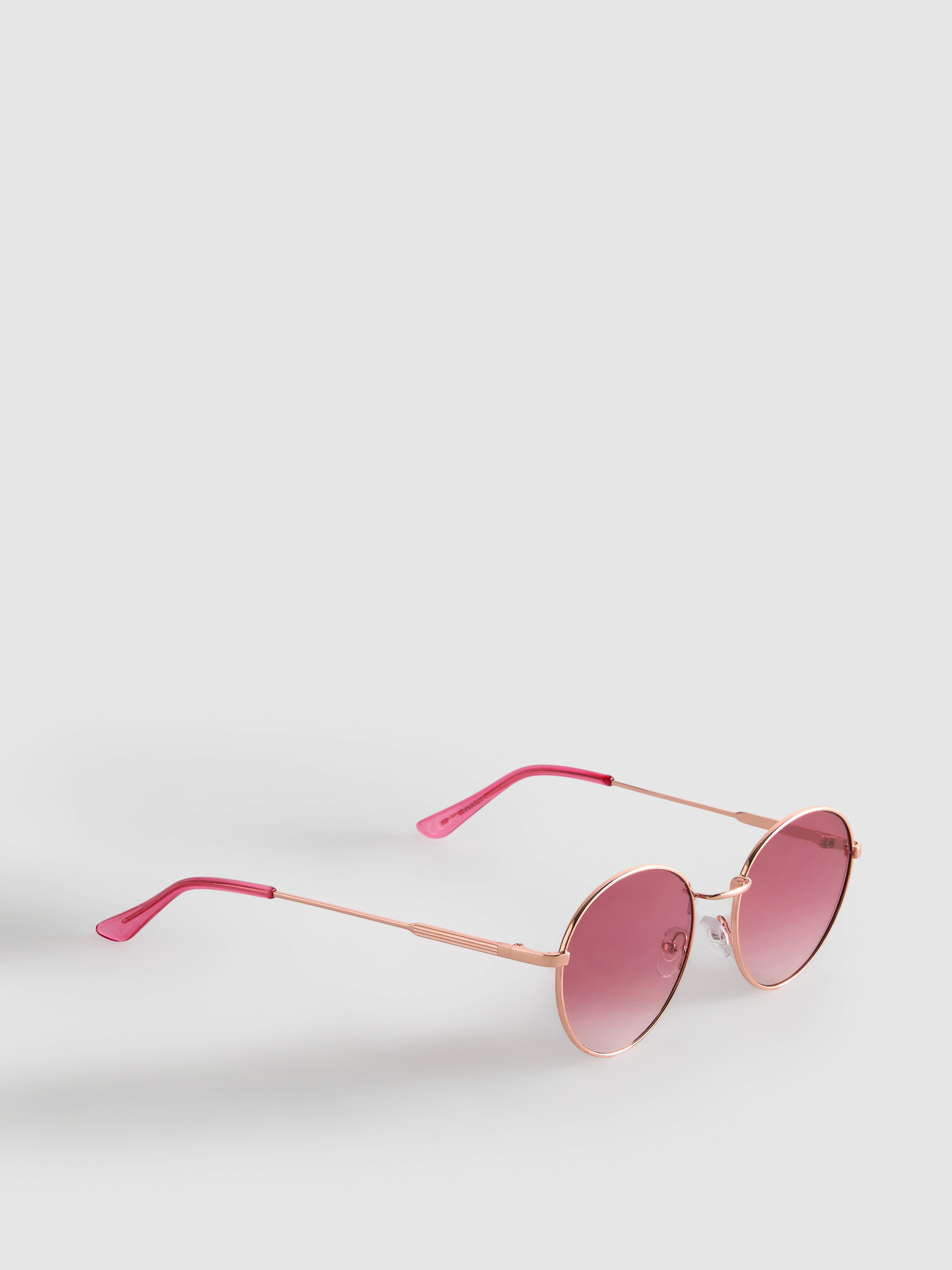 Sonnenbrille mit runden, getönten Gläsern und Metallgestell