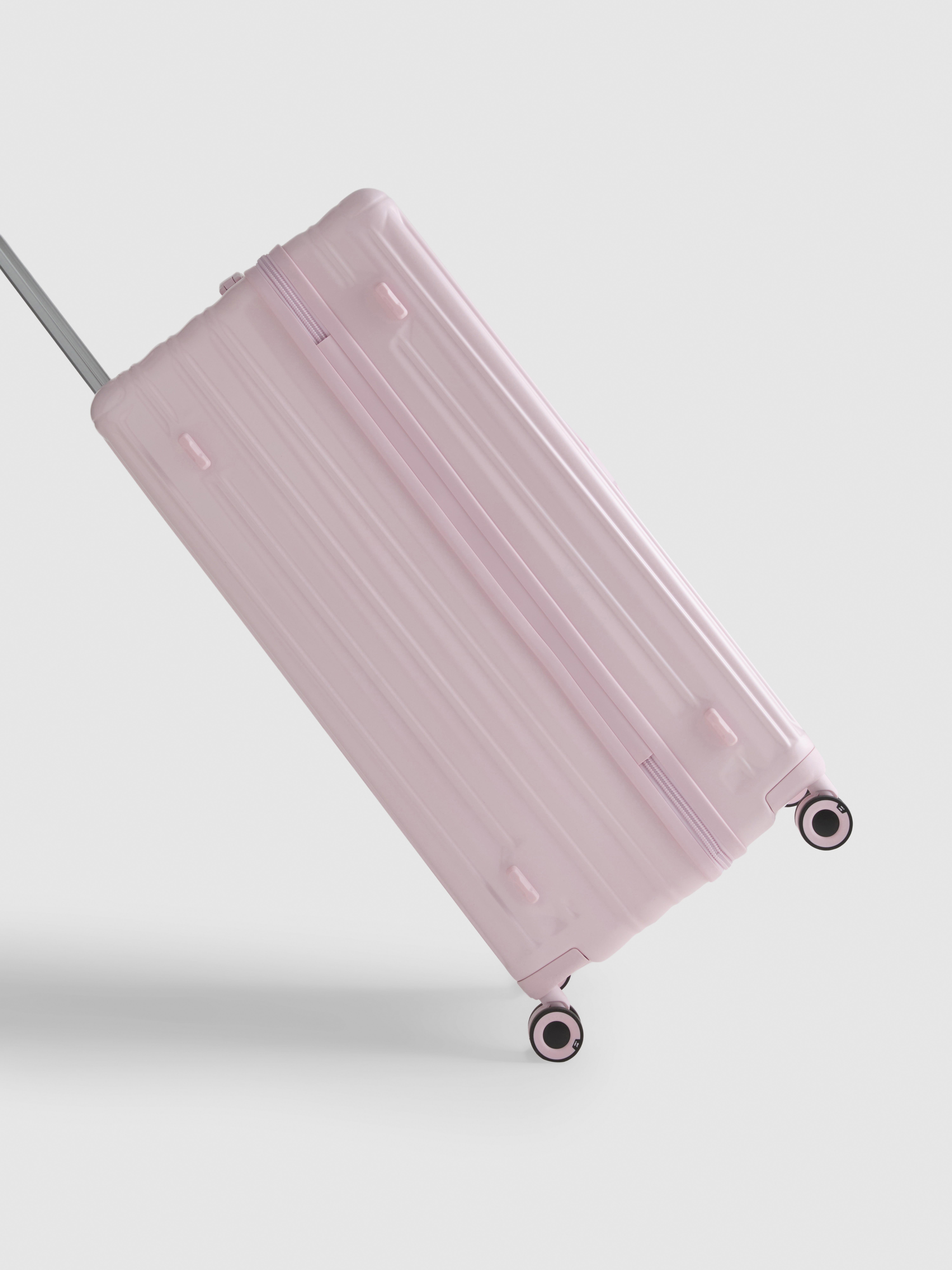 Valise rigide à roulettes