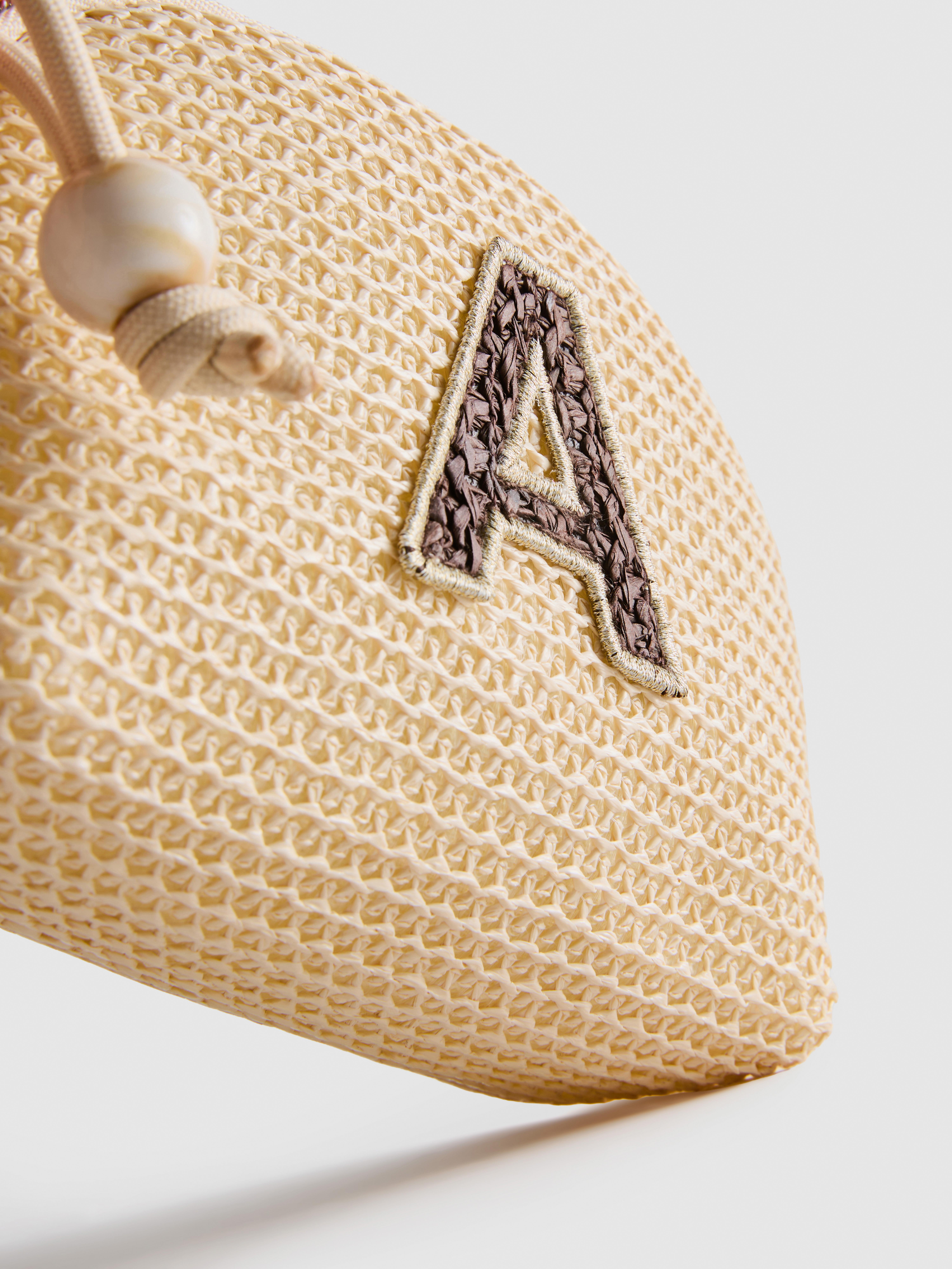 Trousse à maquillage à initiale