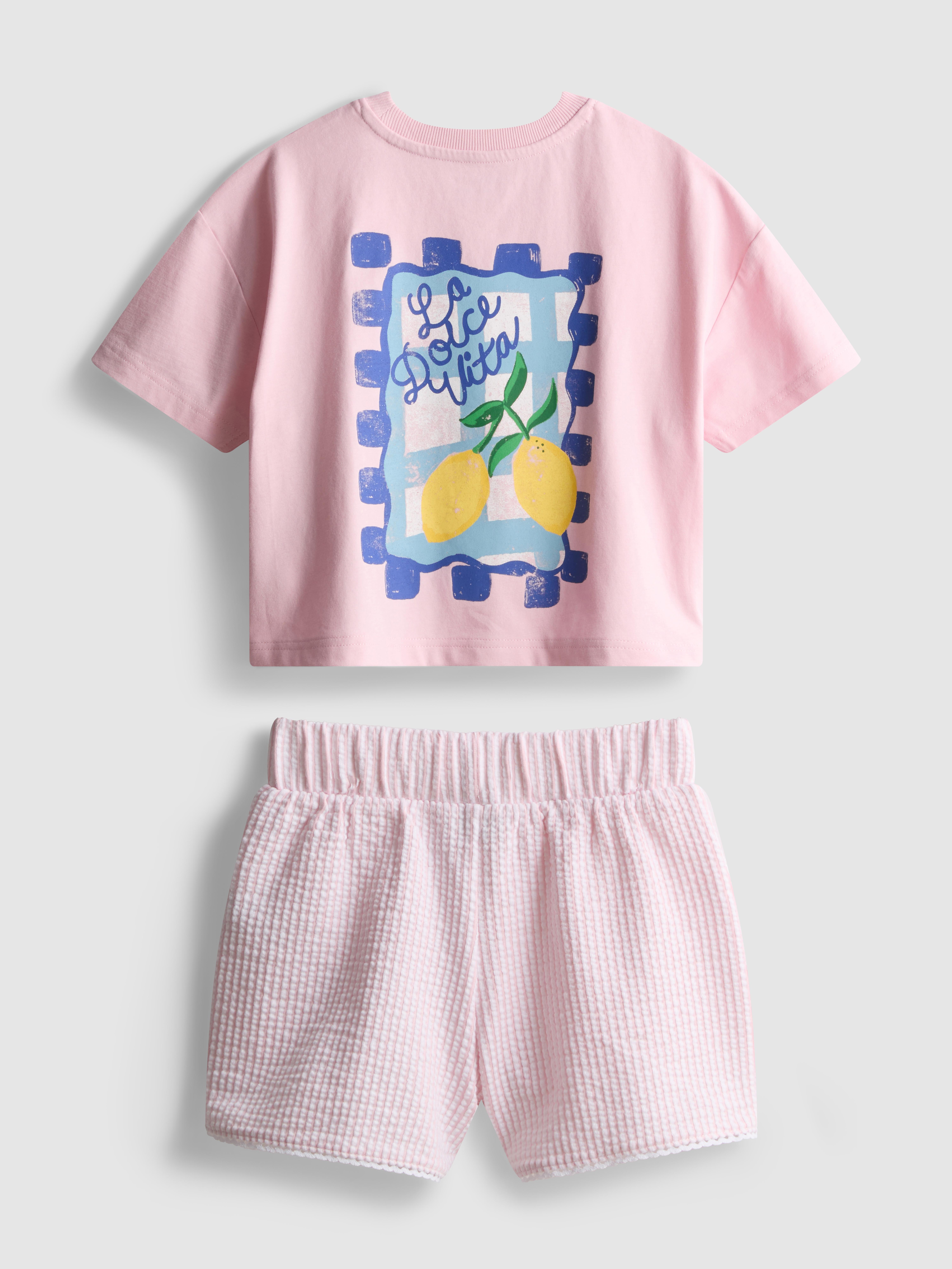 1,5 - 9 ani | Set cu tricou cu croială largă și pantaloni scurți