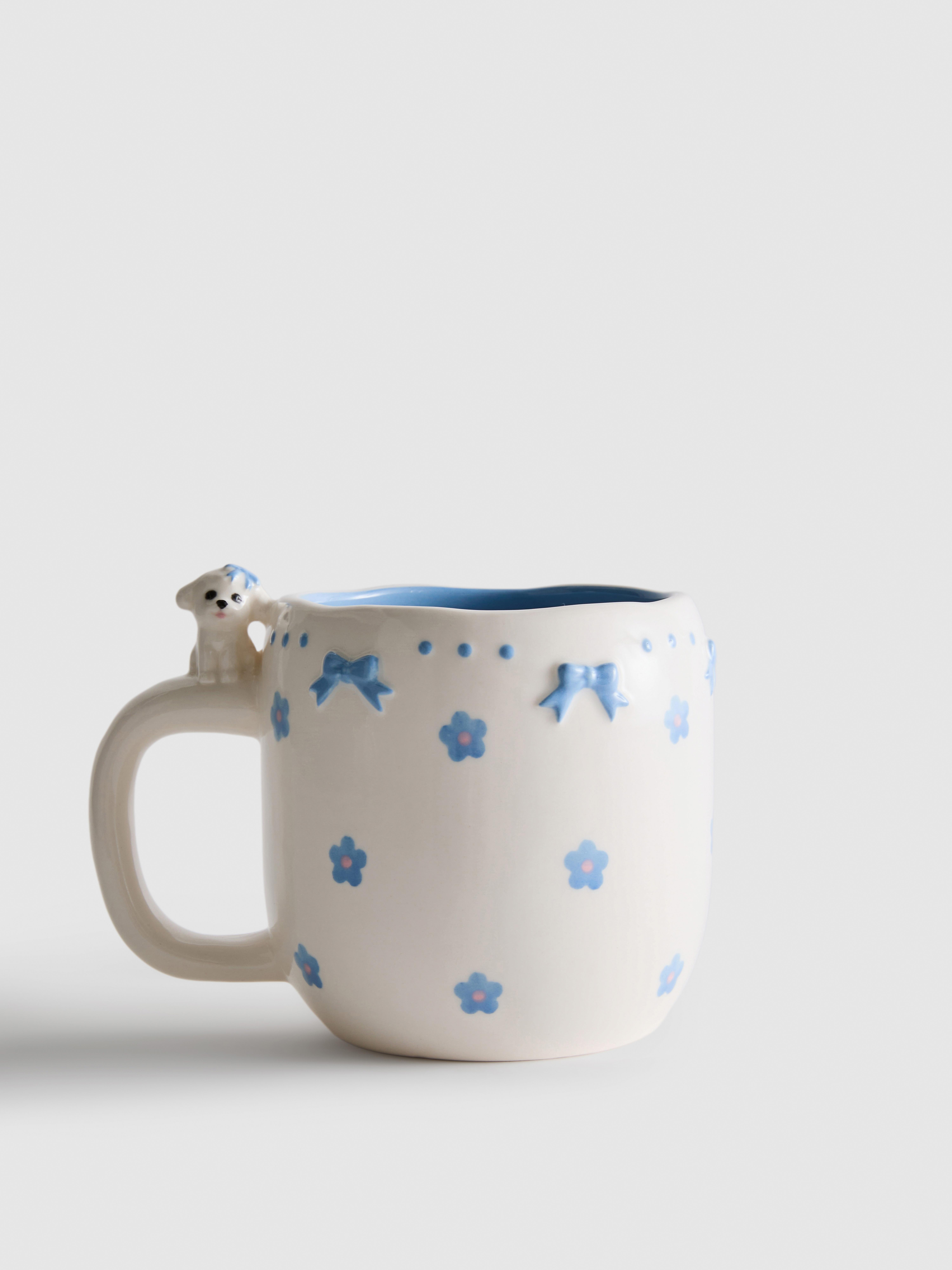 Taza con detalle de bichón maltés