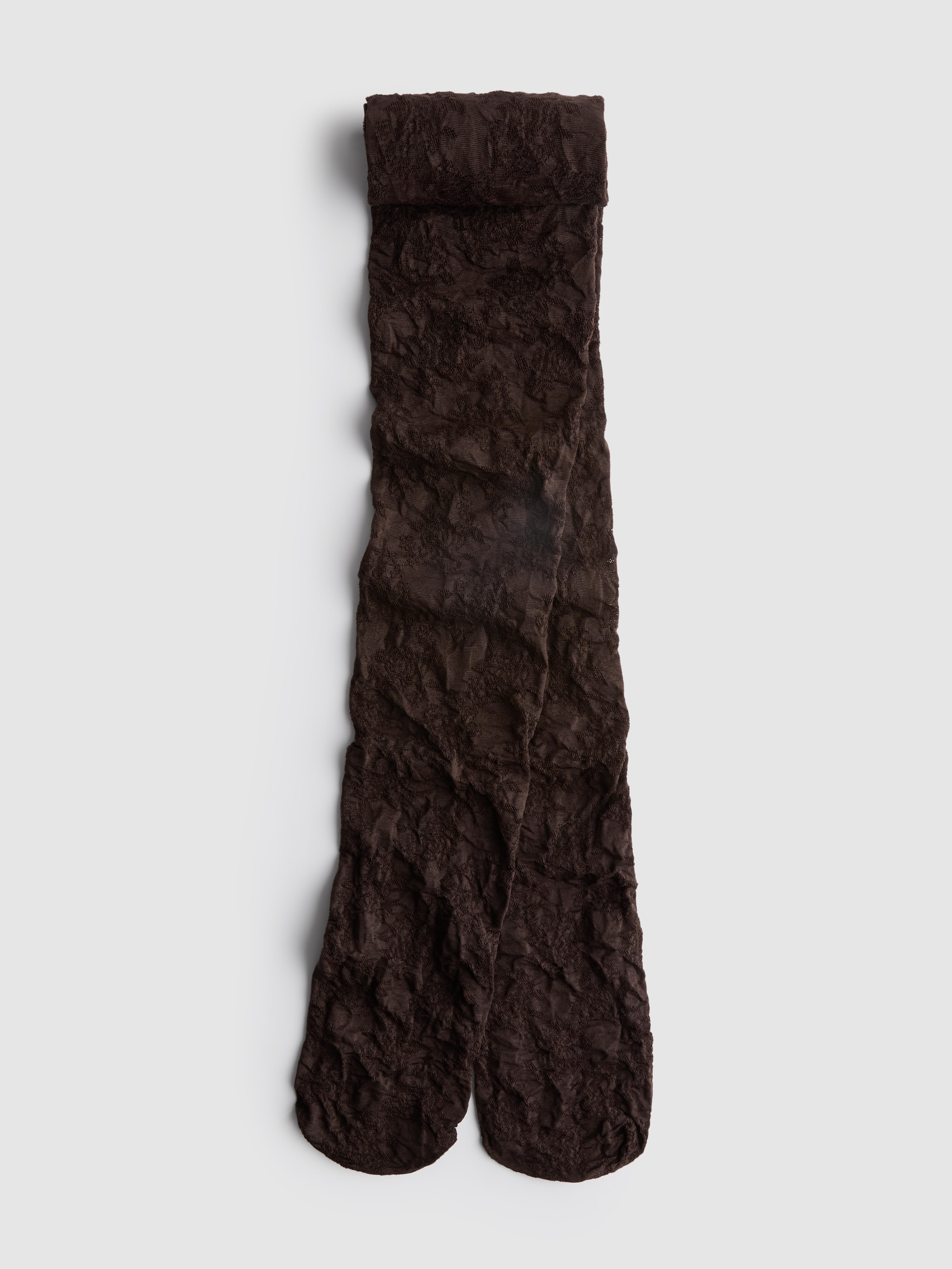 Collants en dentelle à motif floral