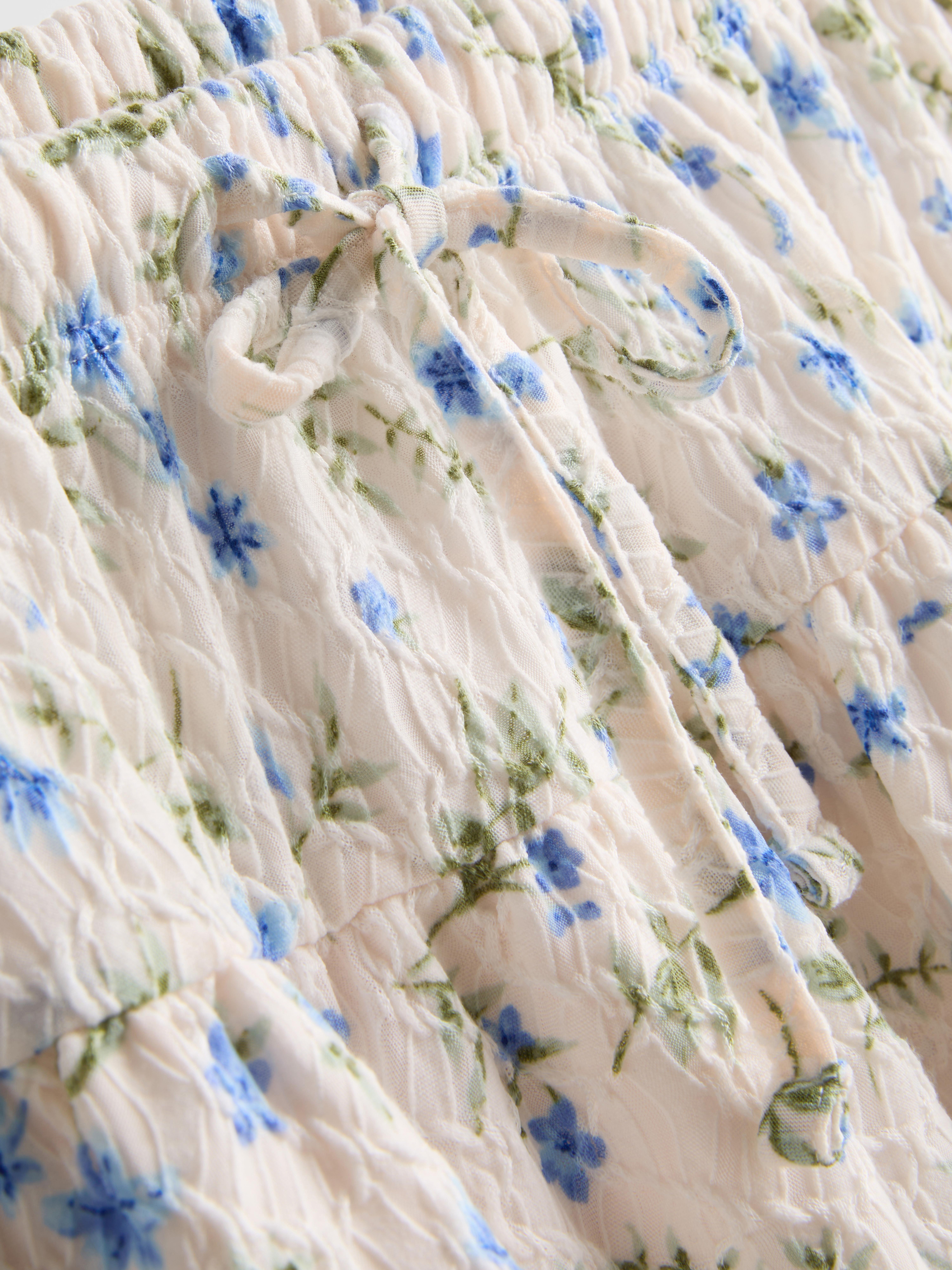 Floral Ruffle Mini Skirt