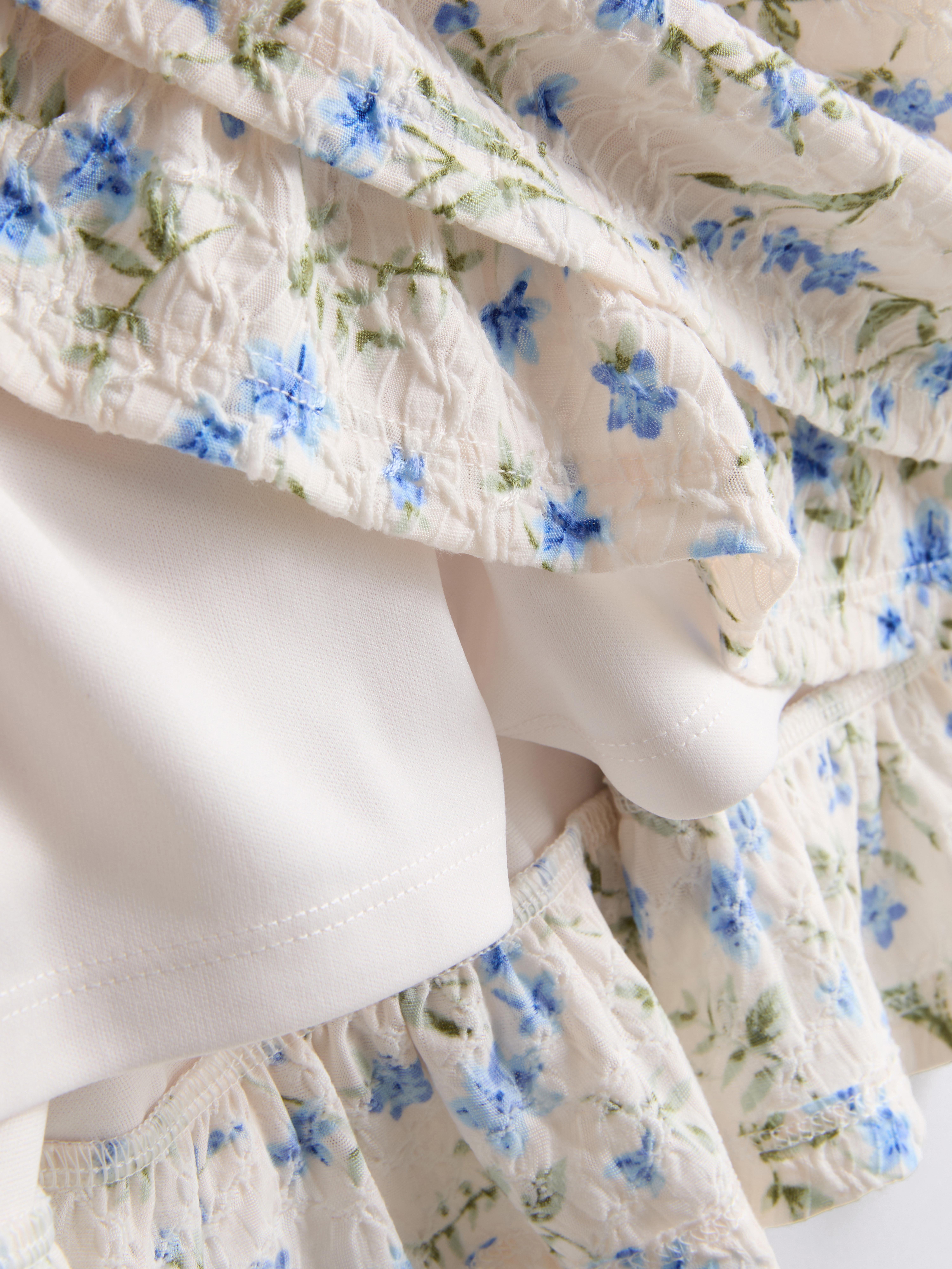 Floral Ruffle Mini Skirt
