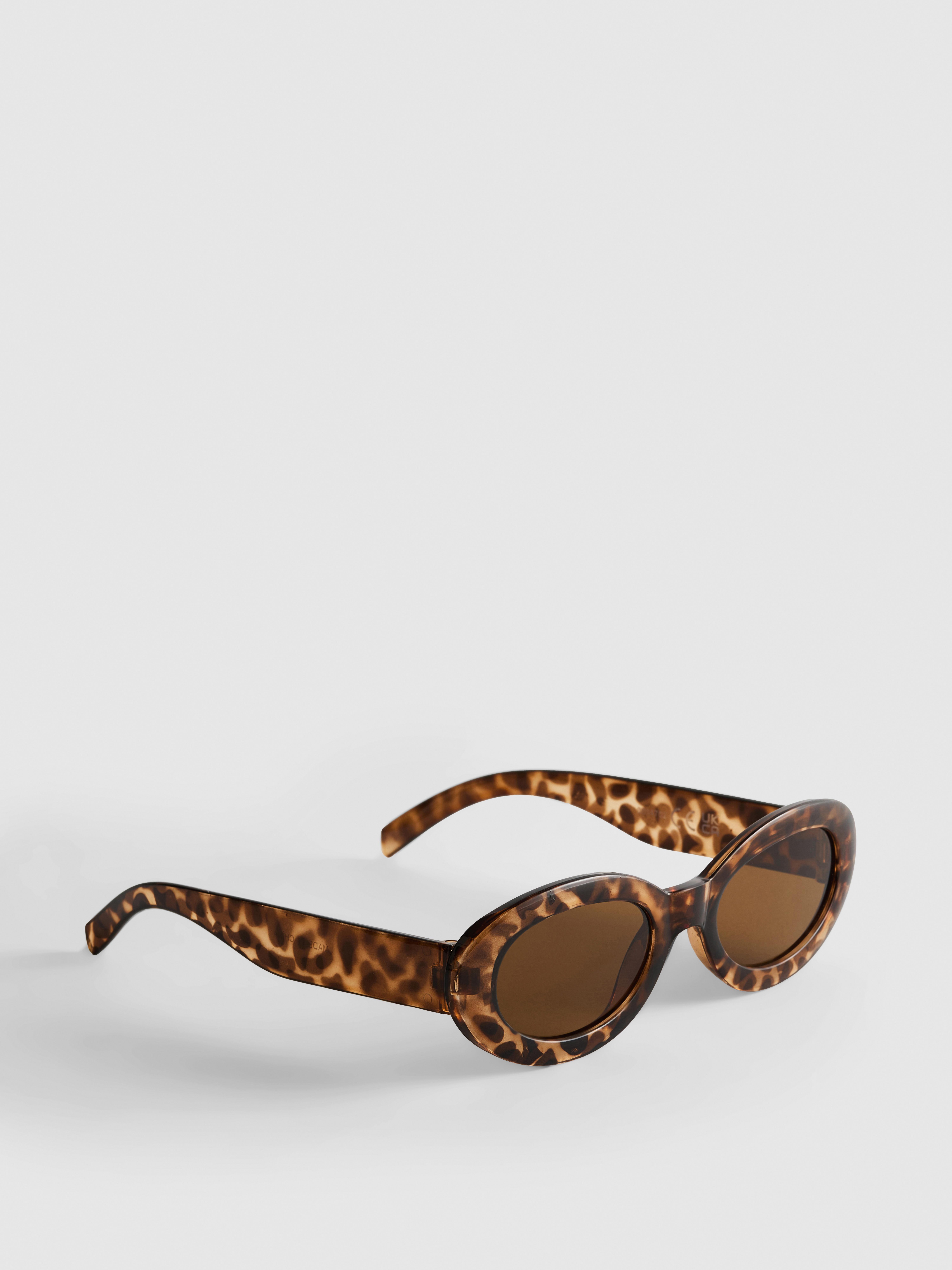 Occhiali da sole ovali con fantasia animalier
