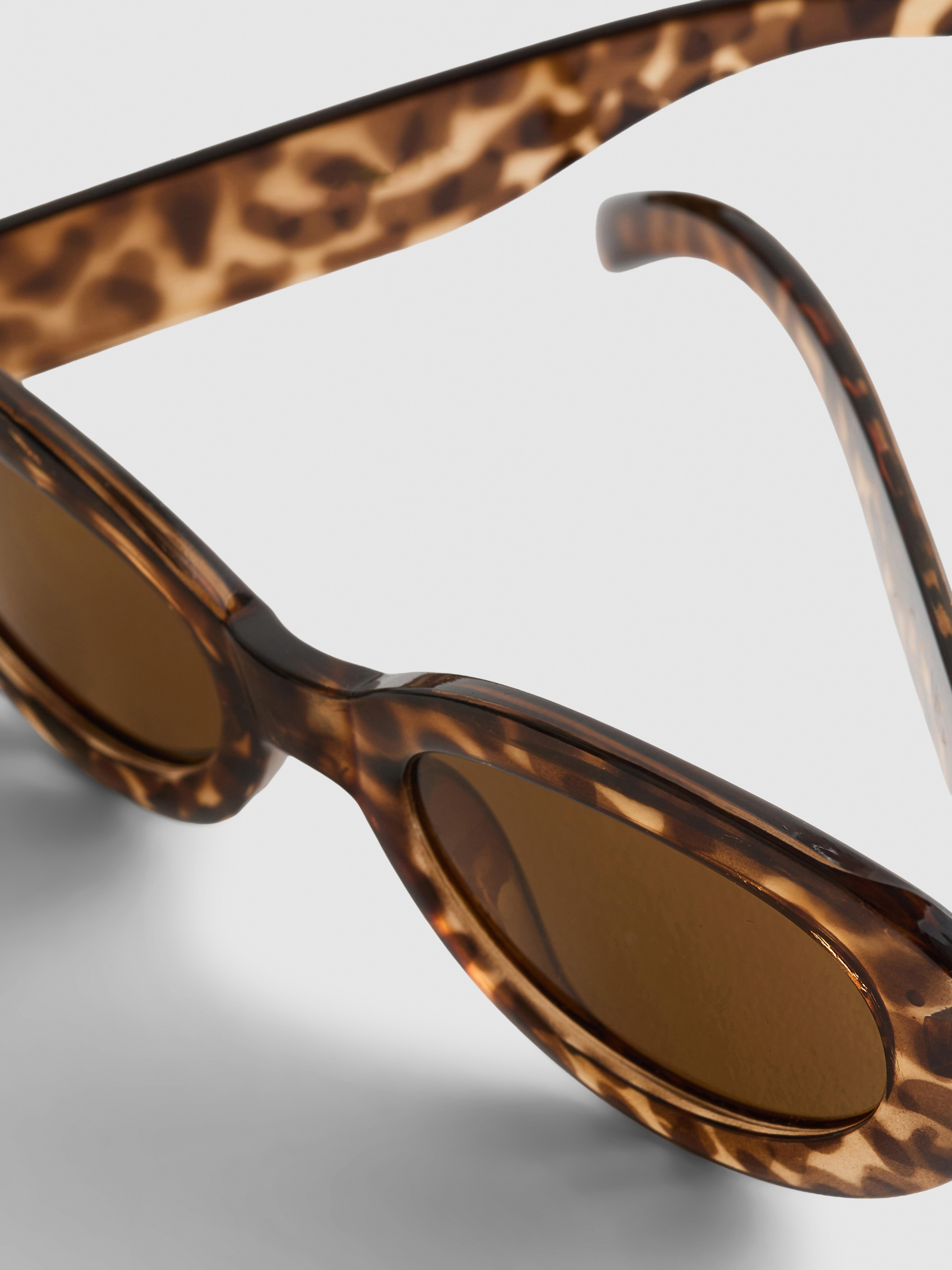 Occhiali da sole ovali con fantasia animalier