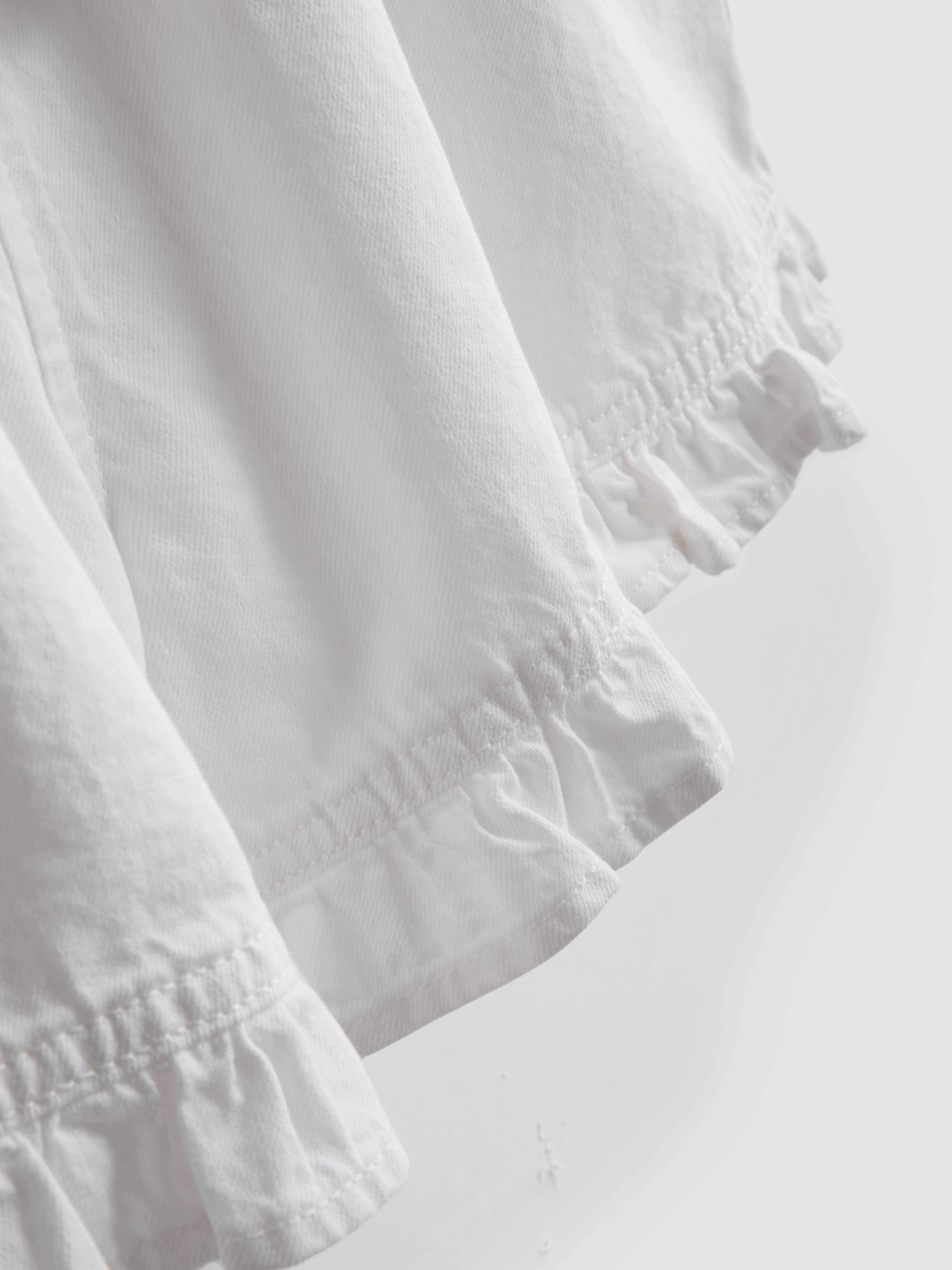 Denim short met ruchezoom