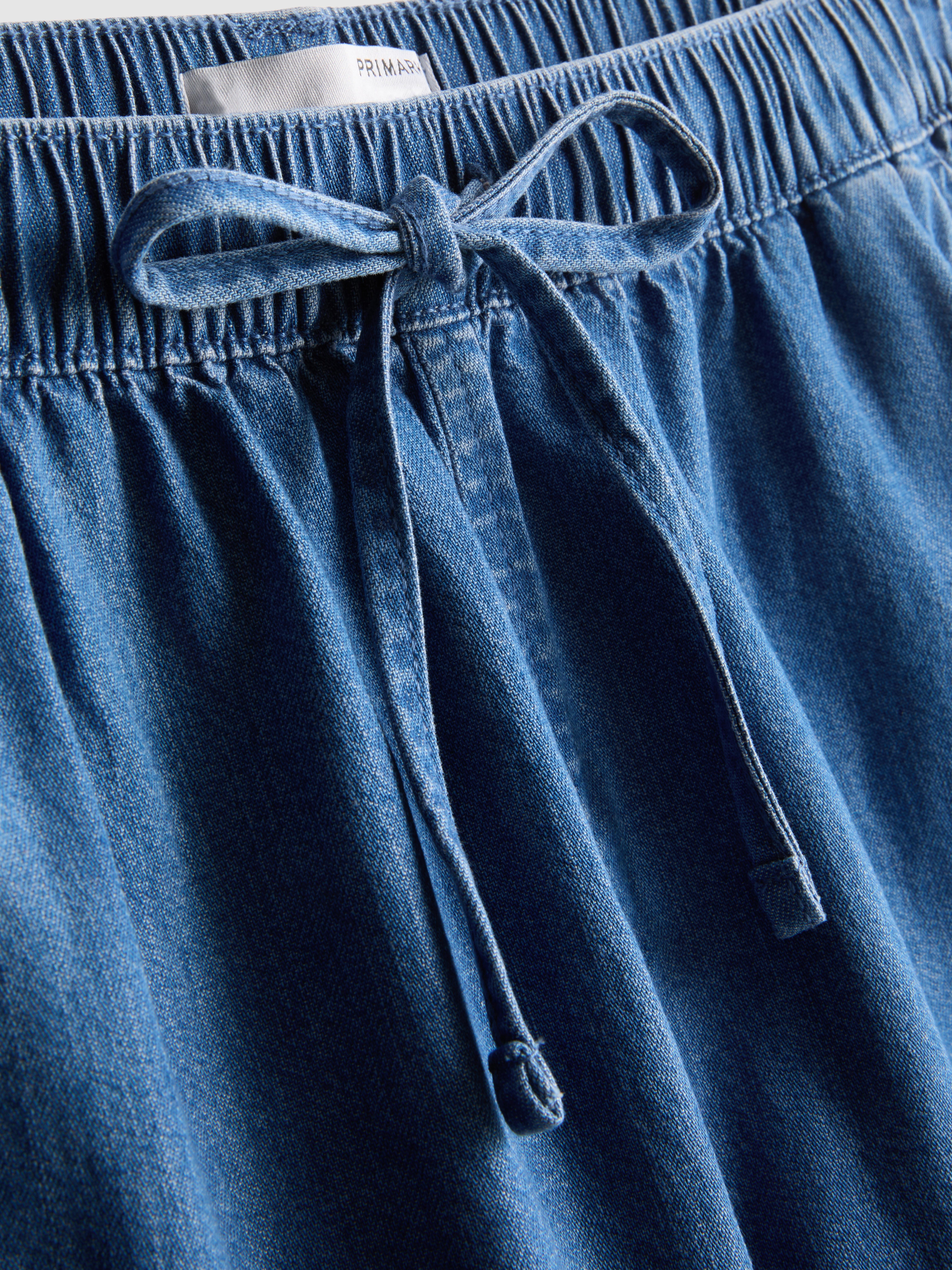 Ruffle Hem Denim Shorts