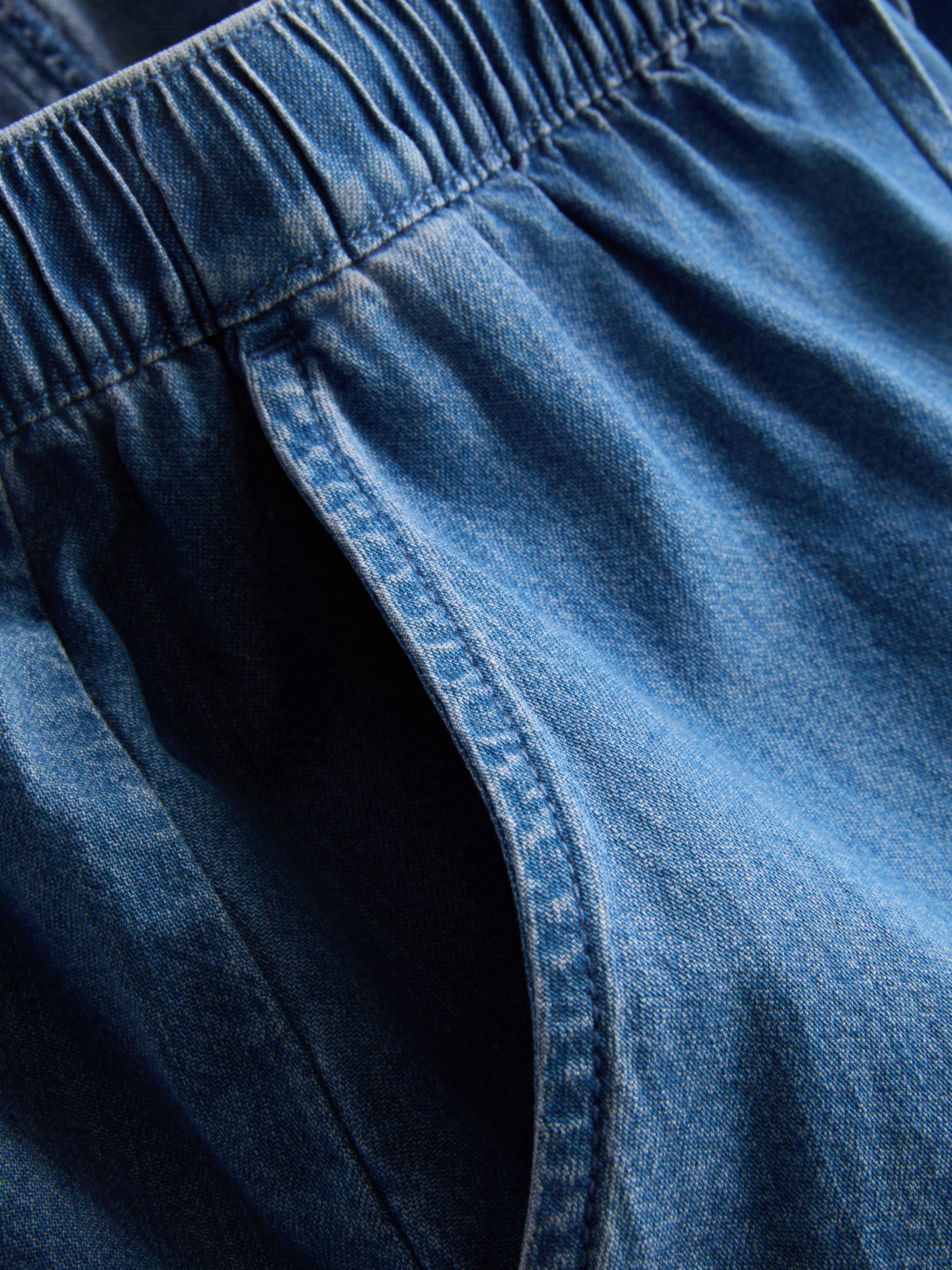 Ruffle Hem Denim Shorts