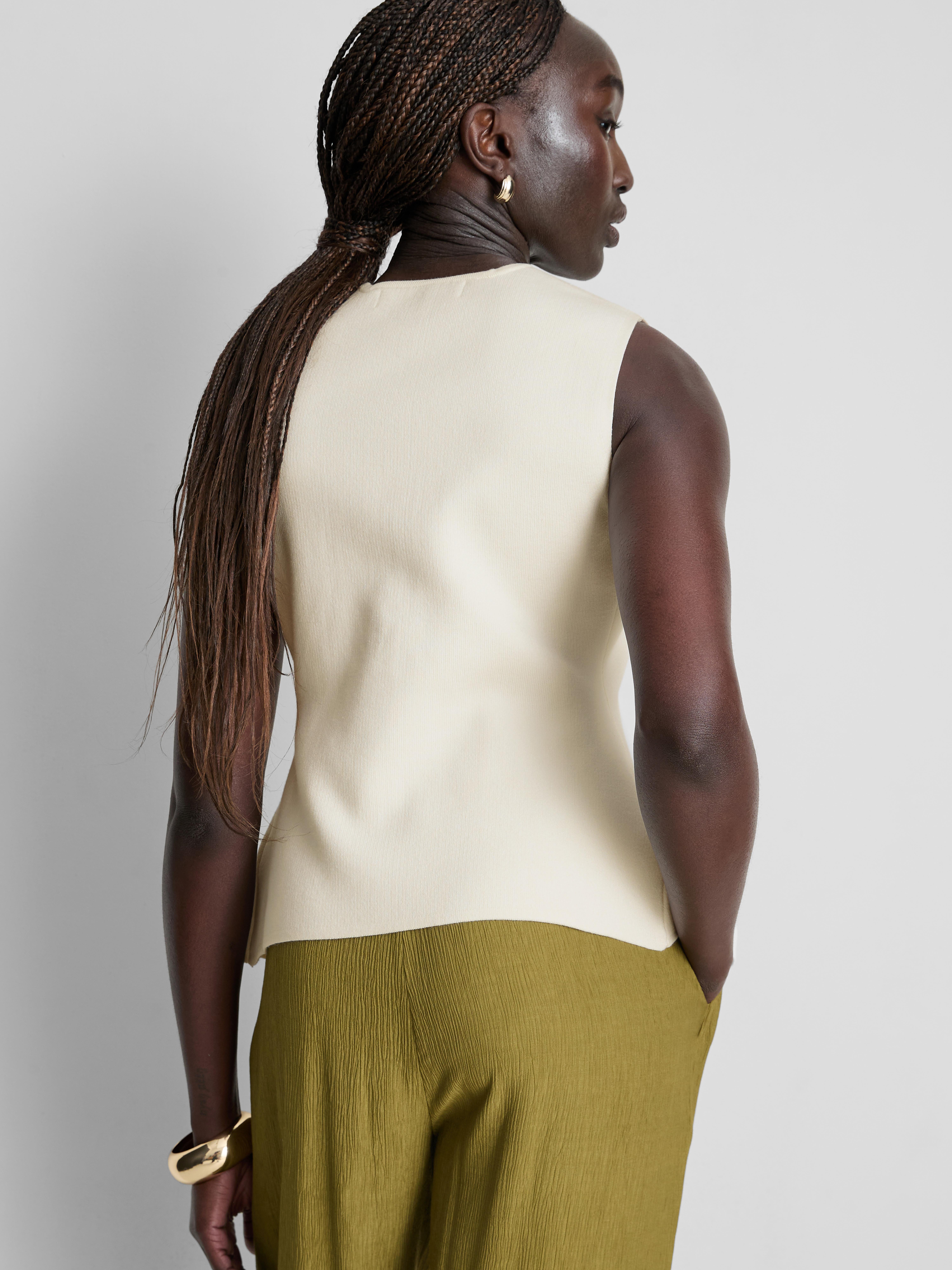 Gilet met bewerkte knopen