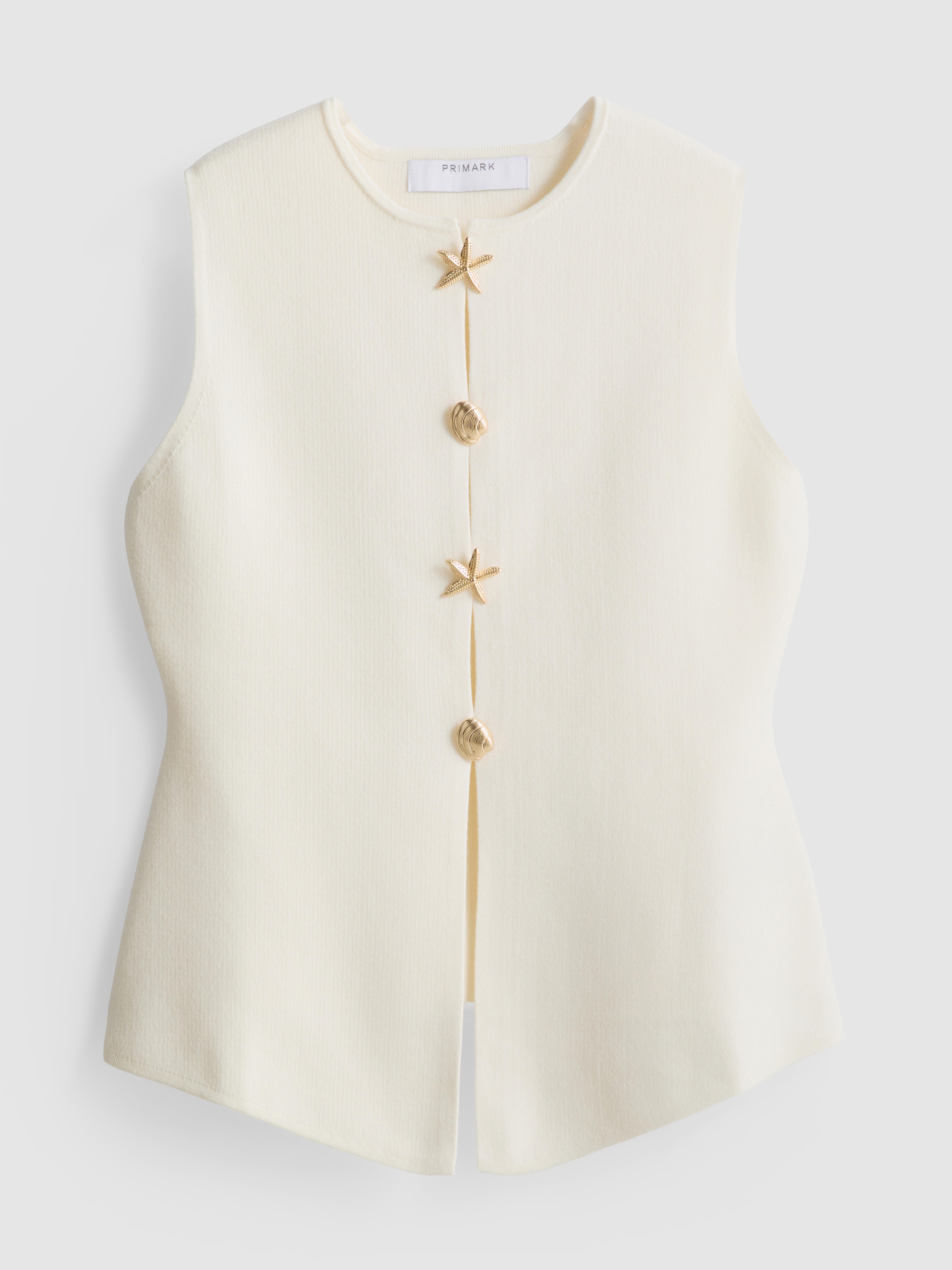 Gilet met bewerkte knopen