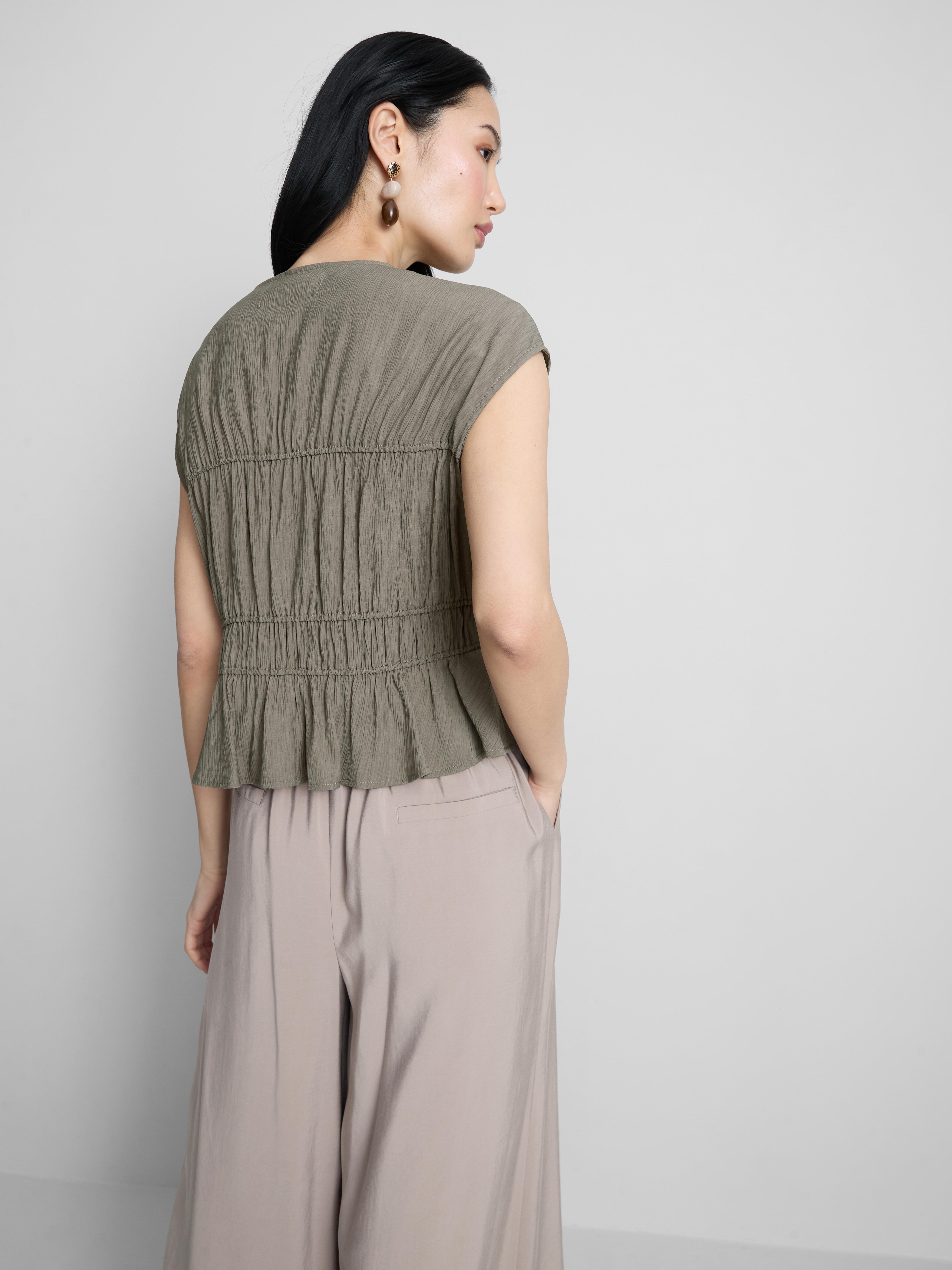 Top in Knitteroptik mit Schleifen
