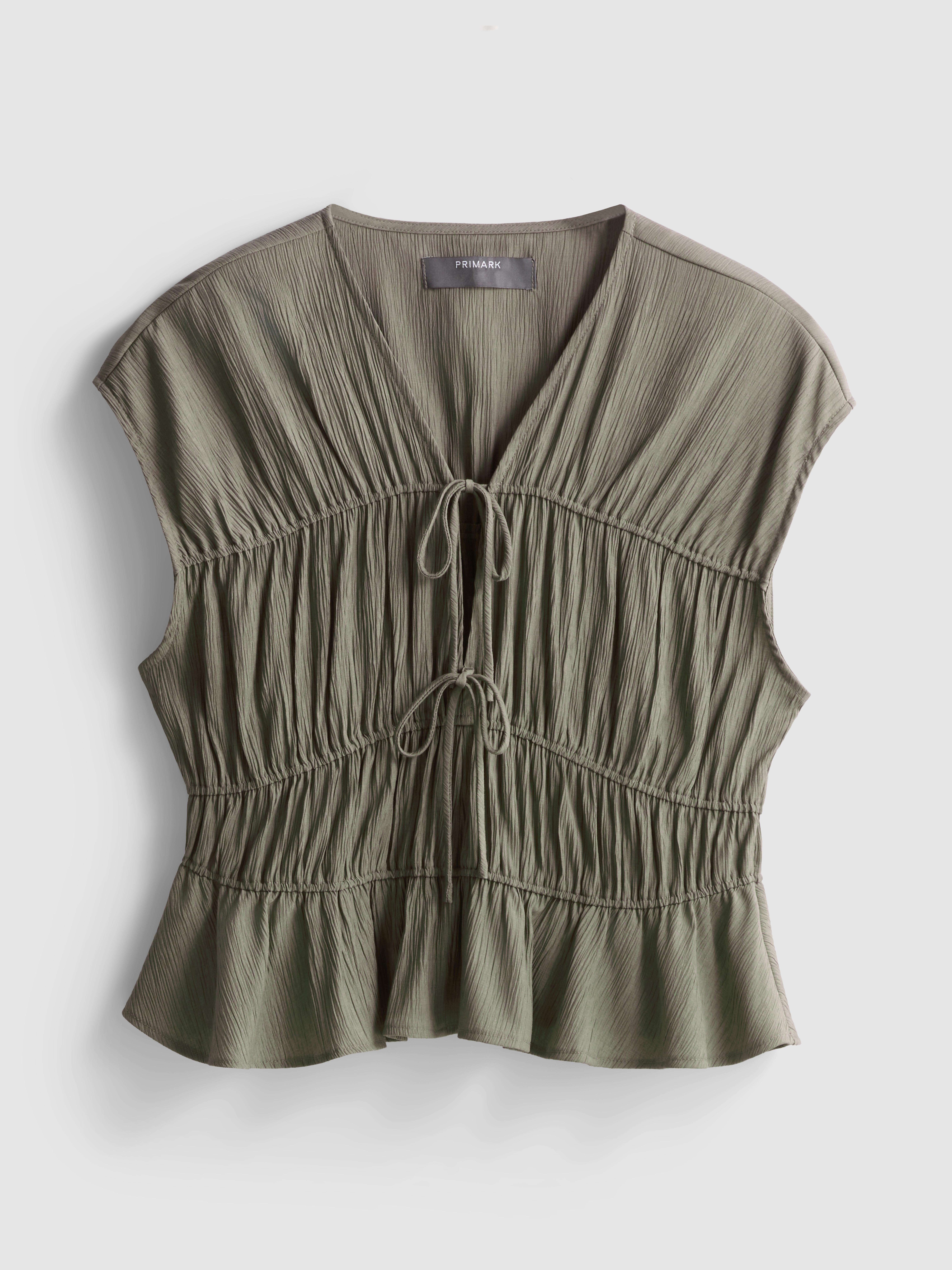 Top in Knitteroptik mit Schleifen