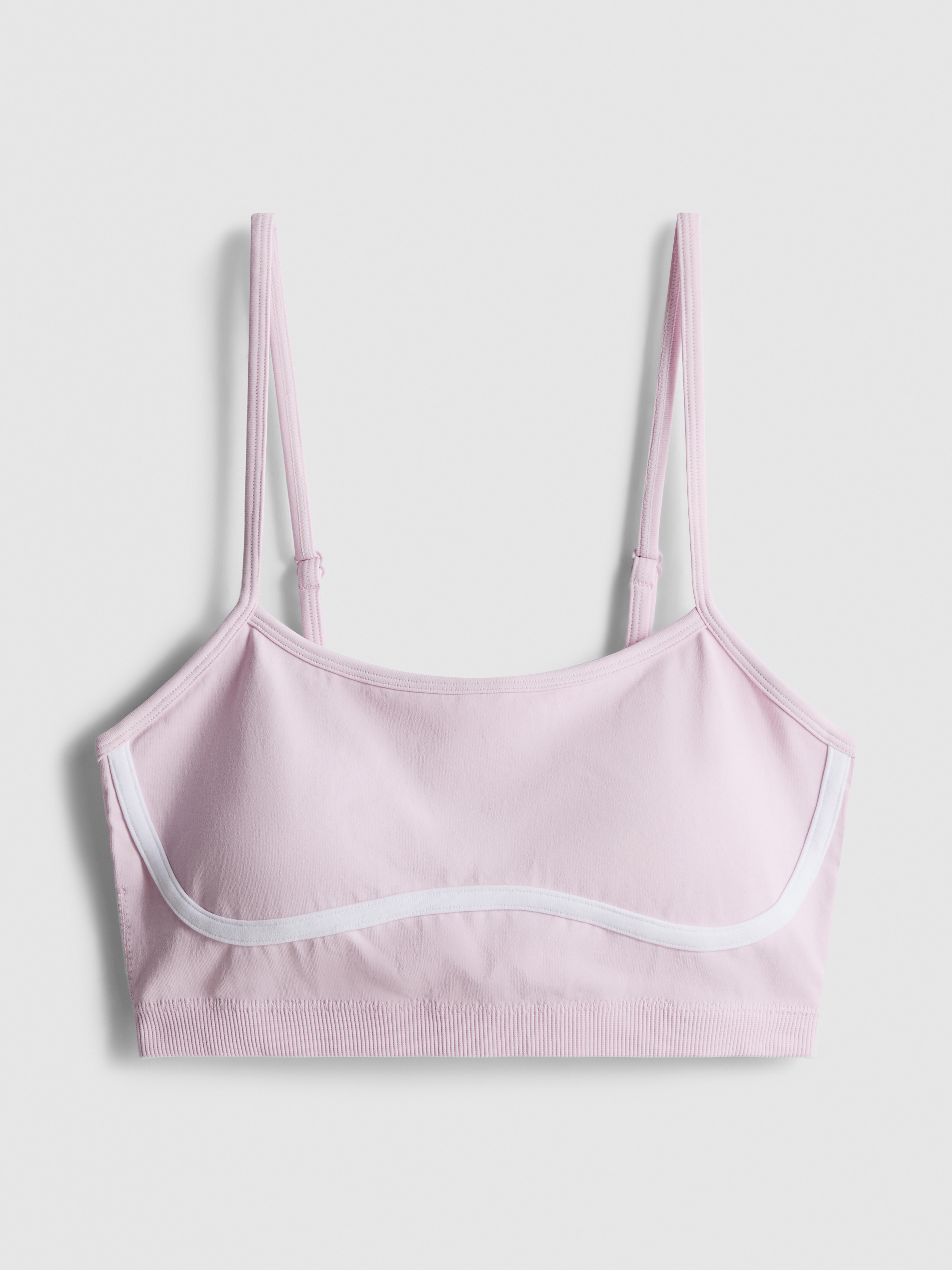Top deportivo sin costuras de diseño contorneado