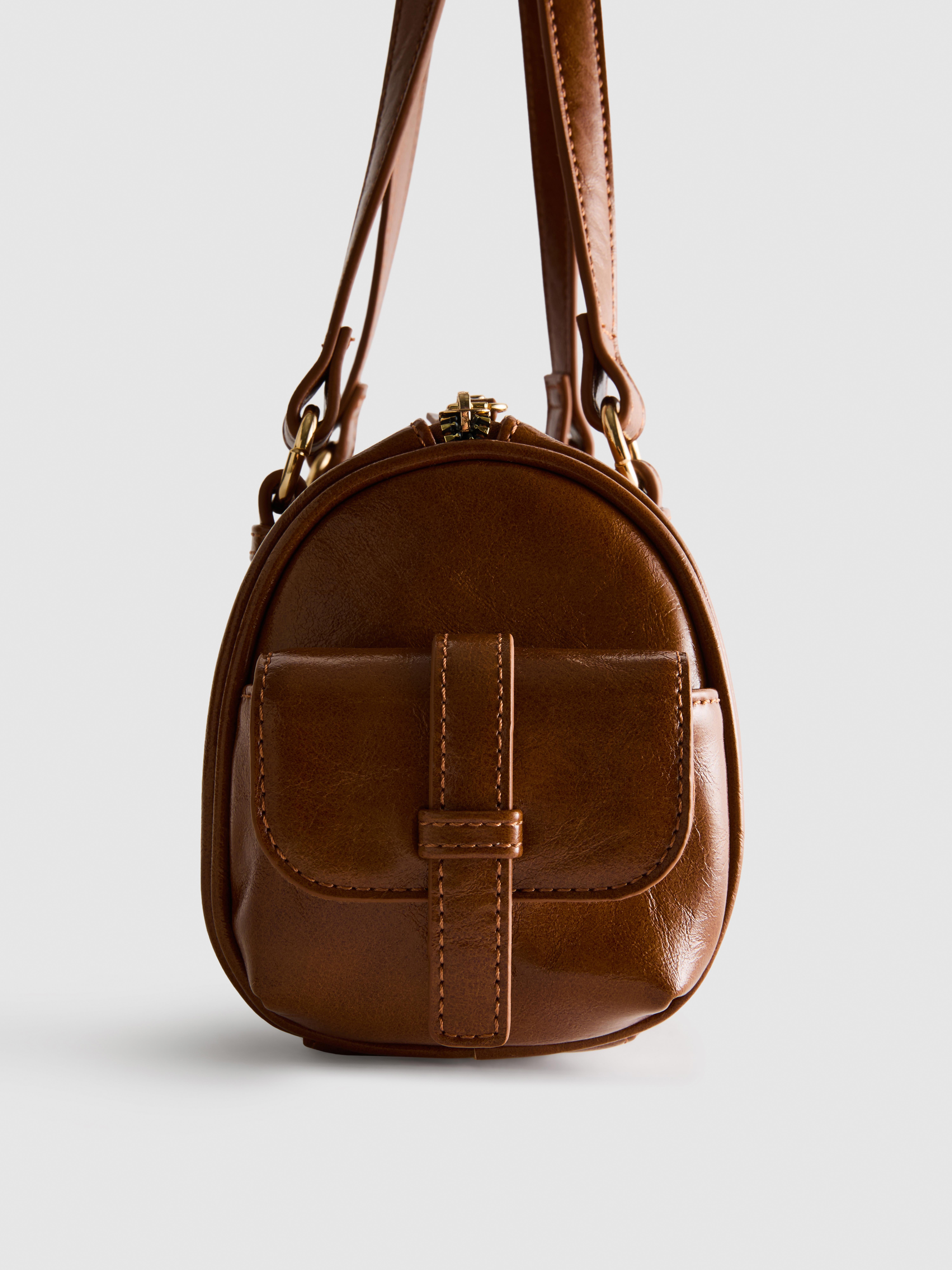 Bolsa bowling imitação pele desgastada