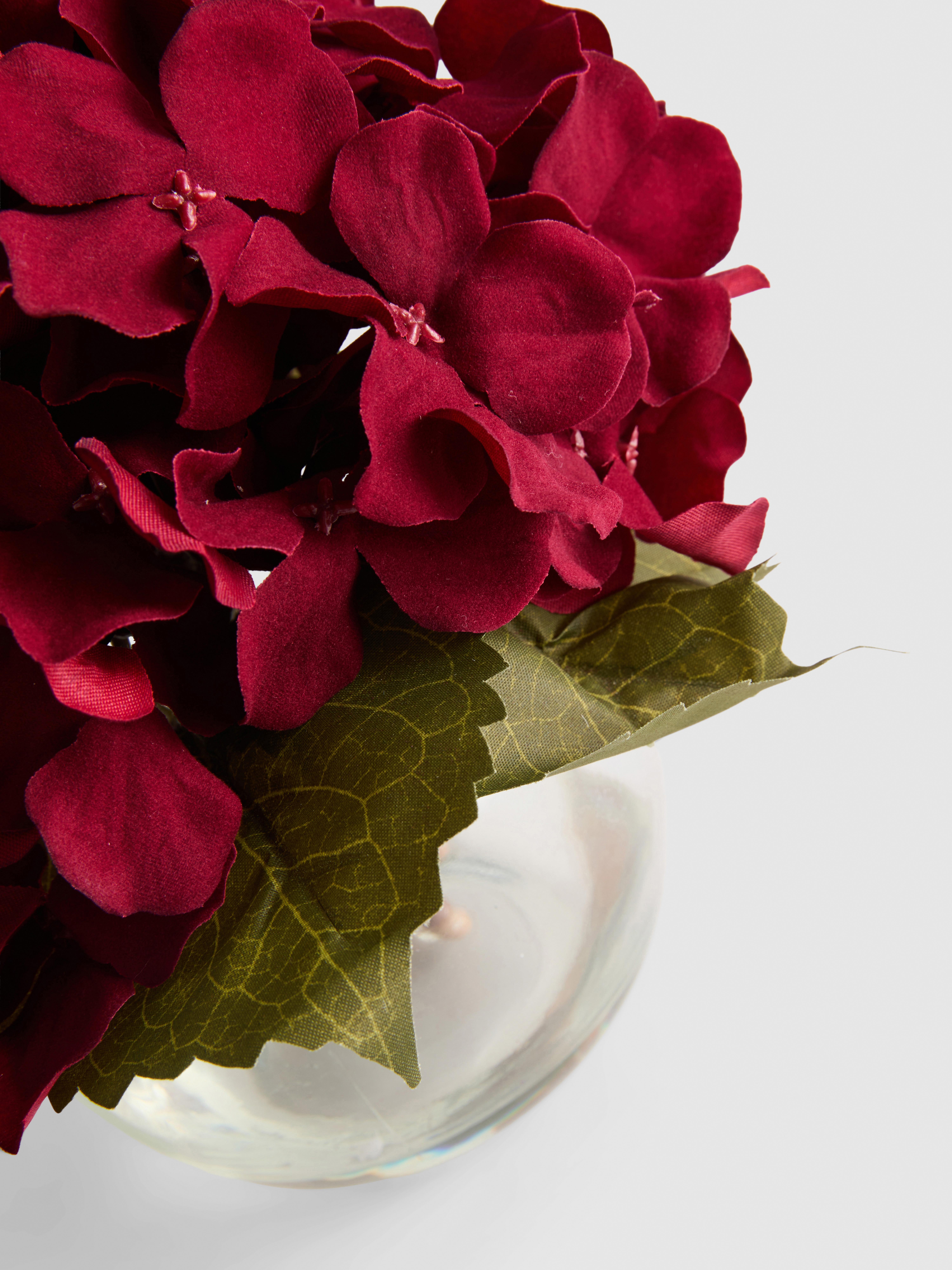 Vase à hortensias artificiels