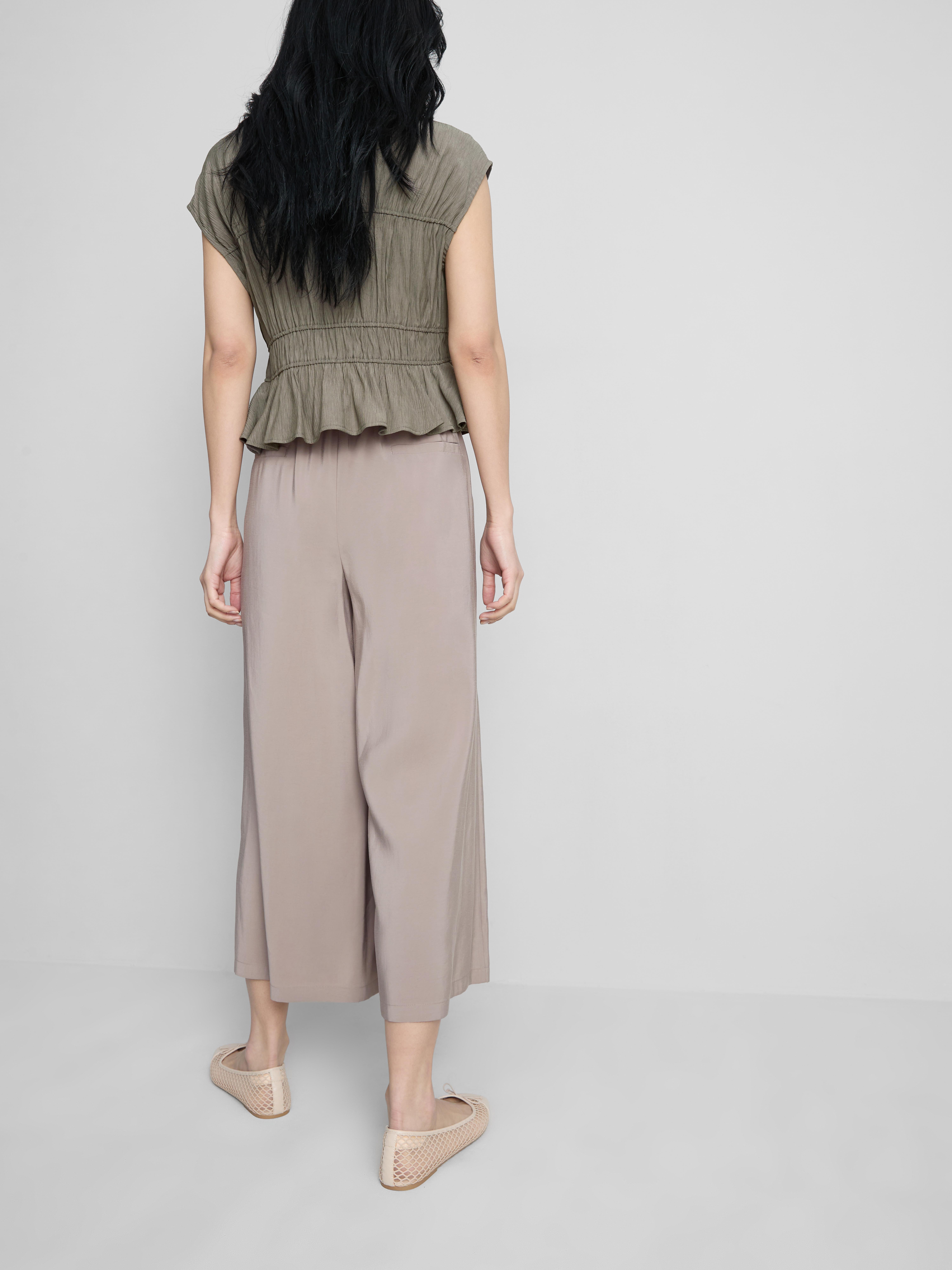 Pantalones anchos tipo culotte de talle medio