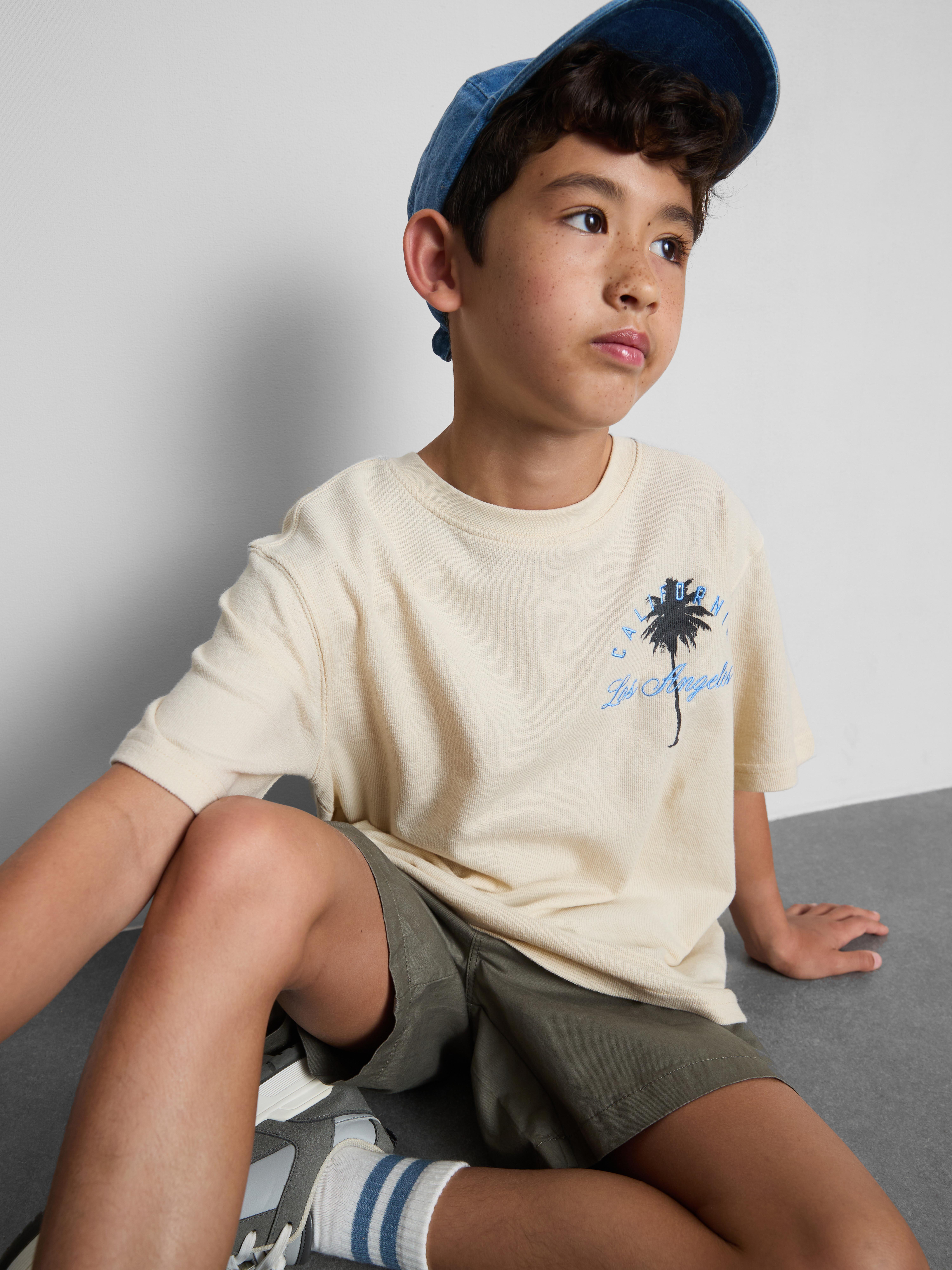 7 - 15 ani | Tricou texturat cu imprimeu cu palmieri