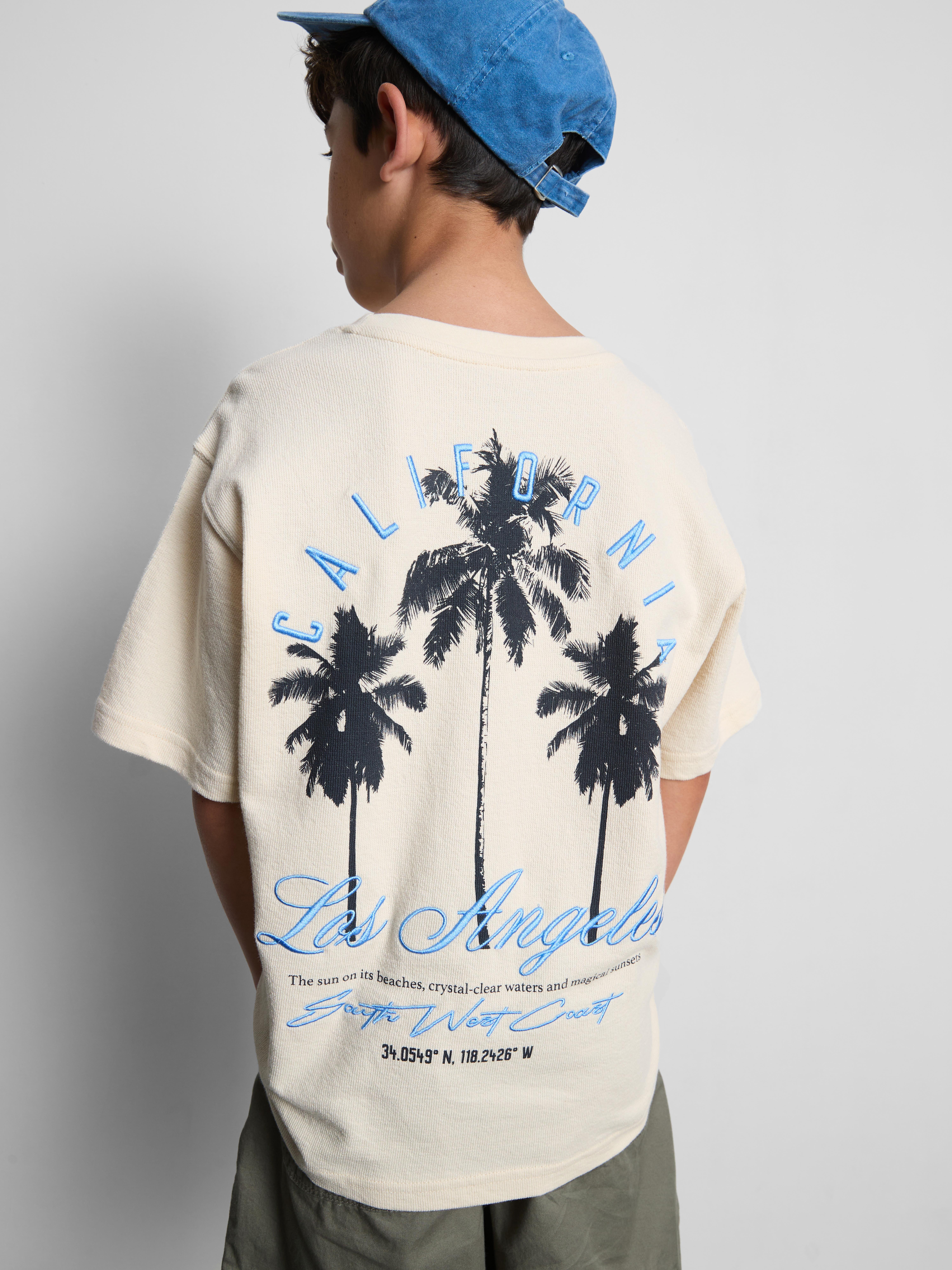7-15 años | Camiseta texturizada con palmeras