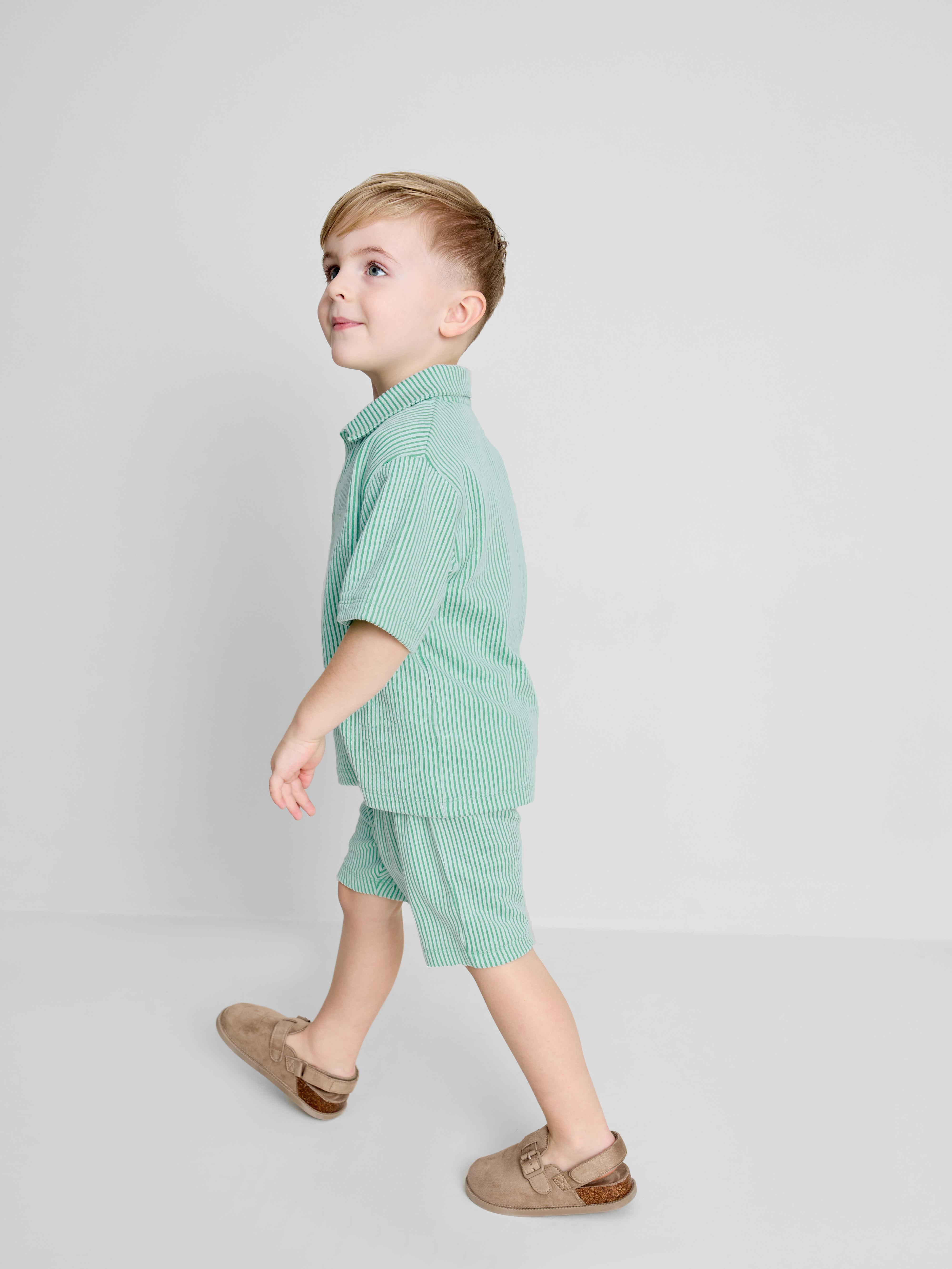 1,5-9 anos | Conjunto camisa/calções riscas