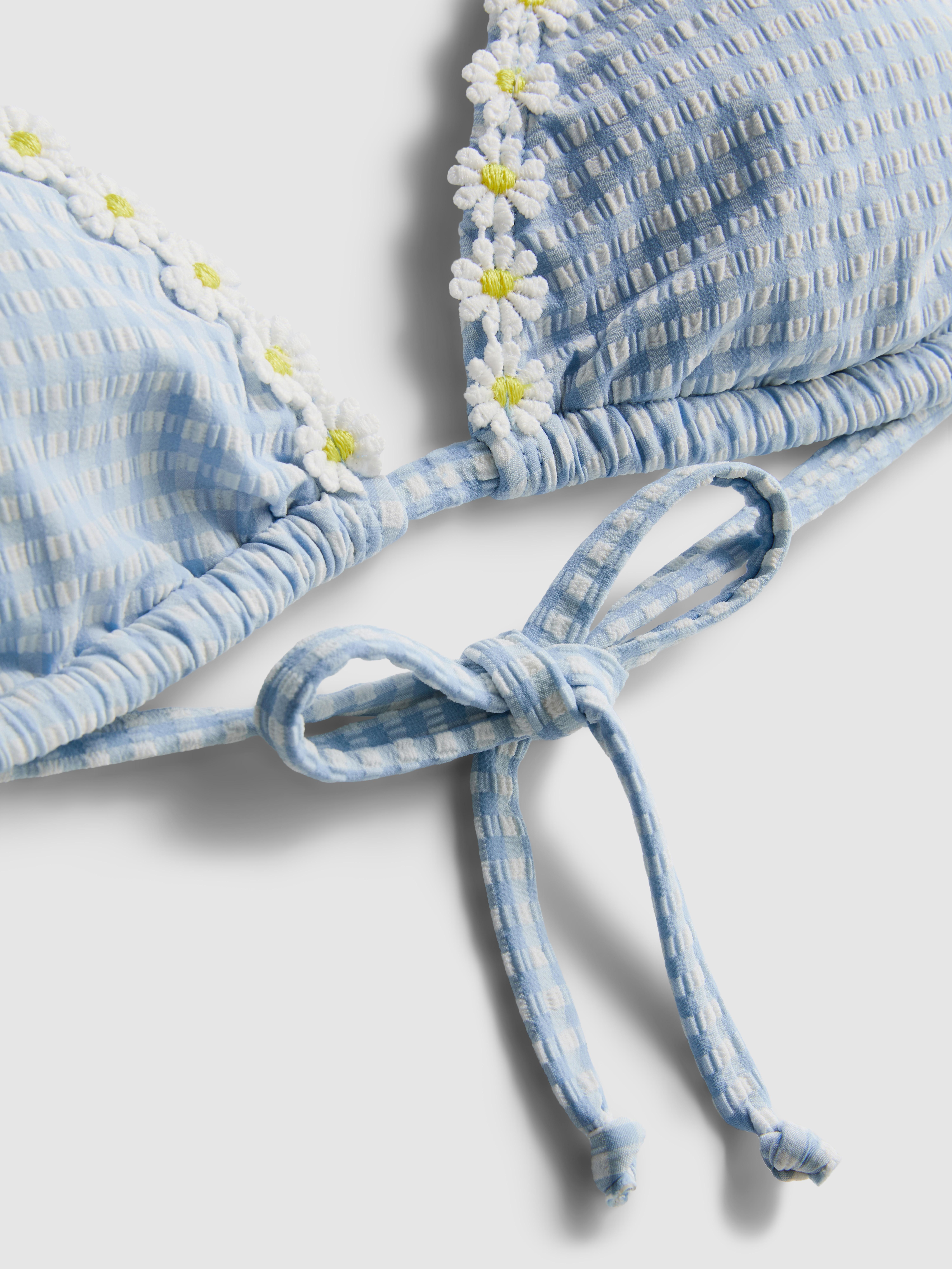 Geruit triangelbikinitopje met madeliefjes