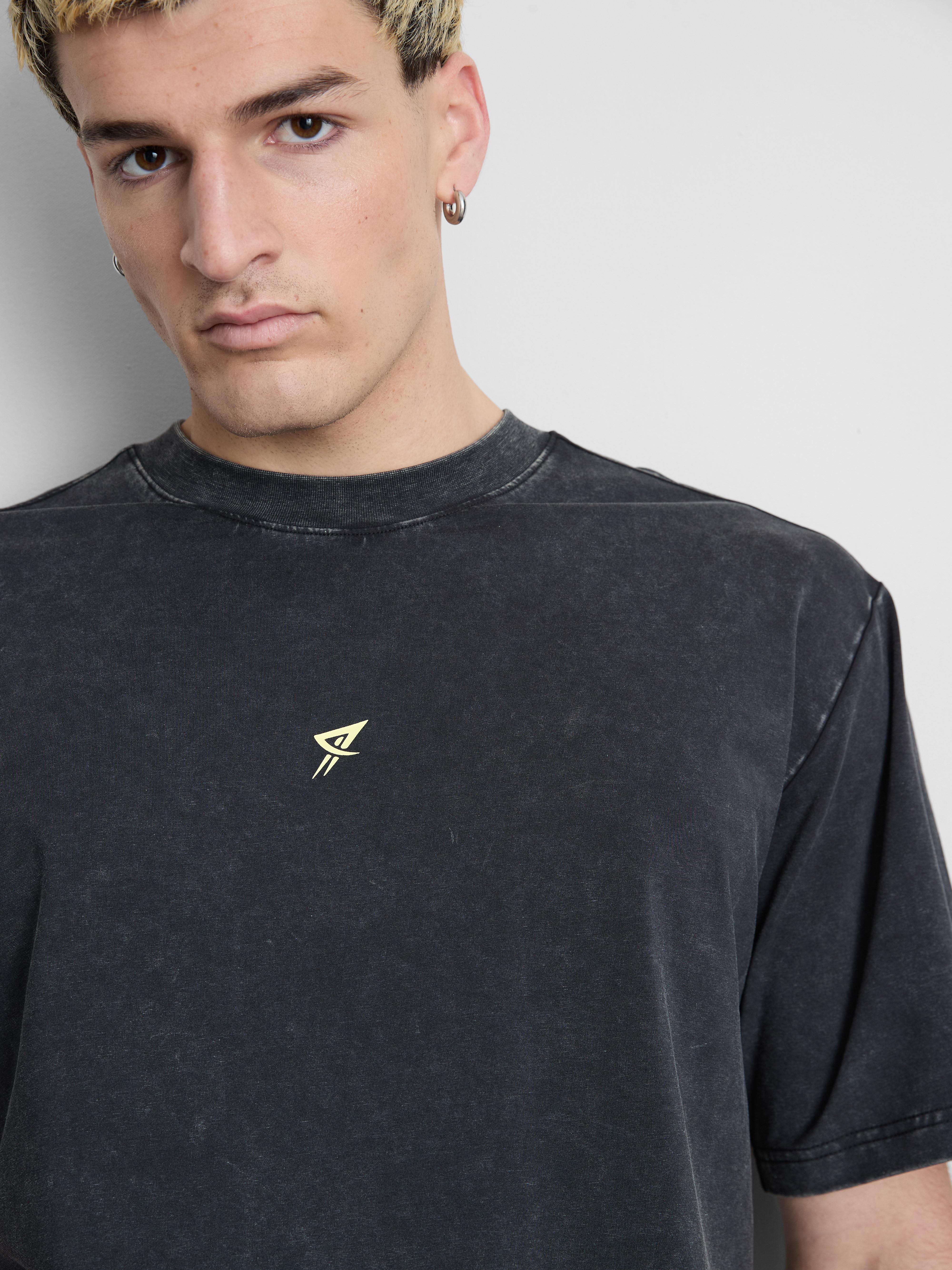 T-shirt de sport délavé à motif