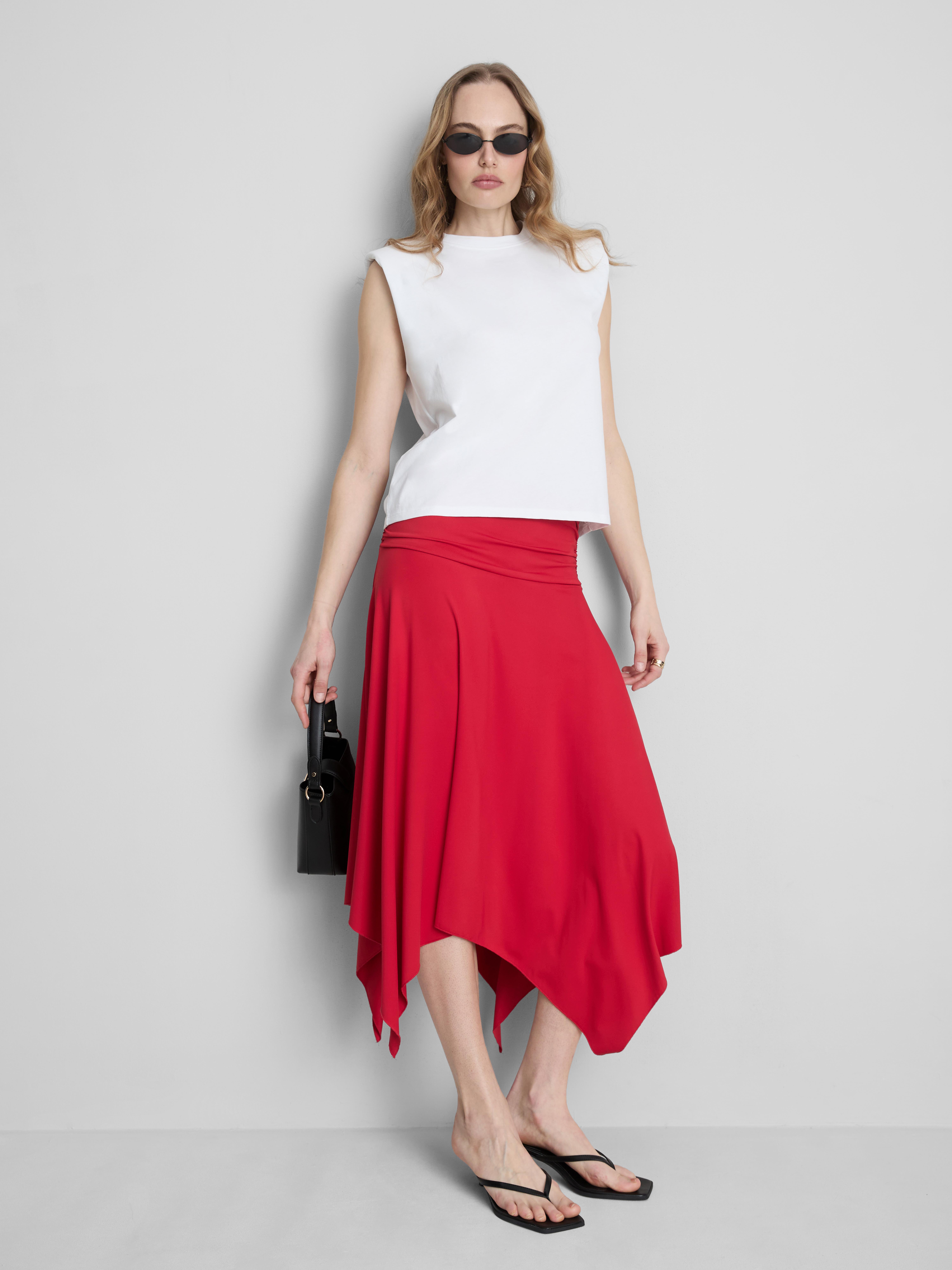 Halflange rok met puntige zoom