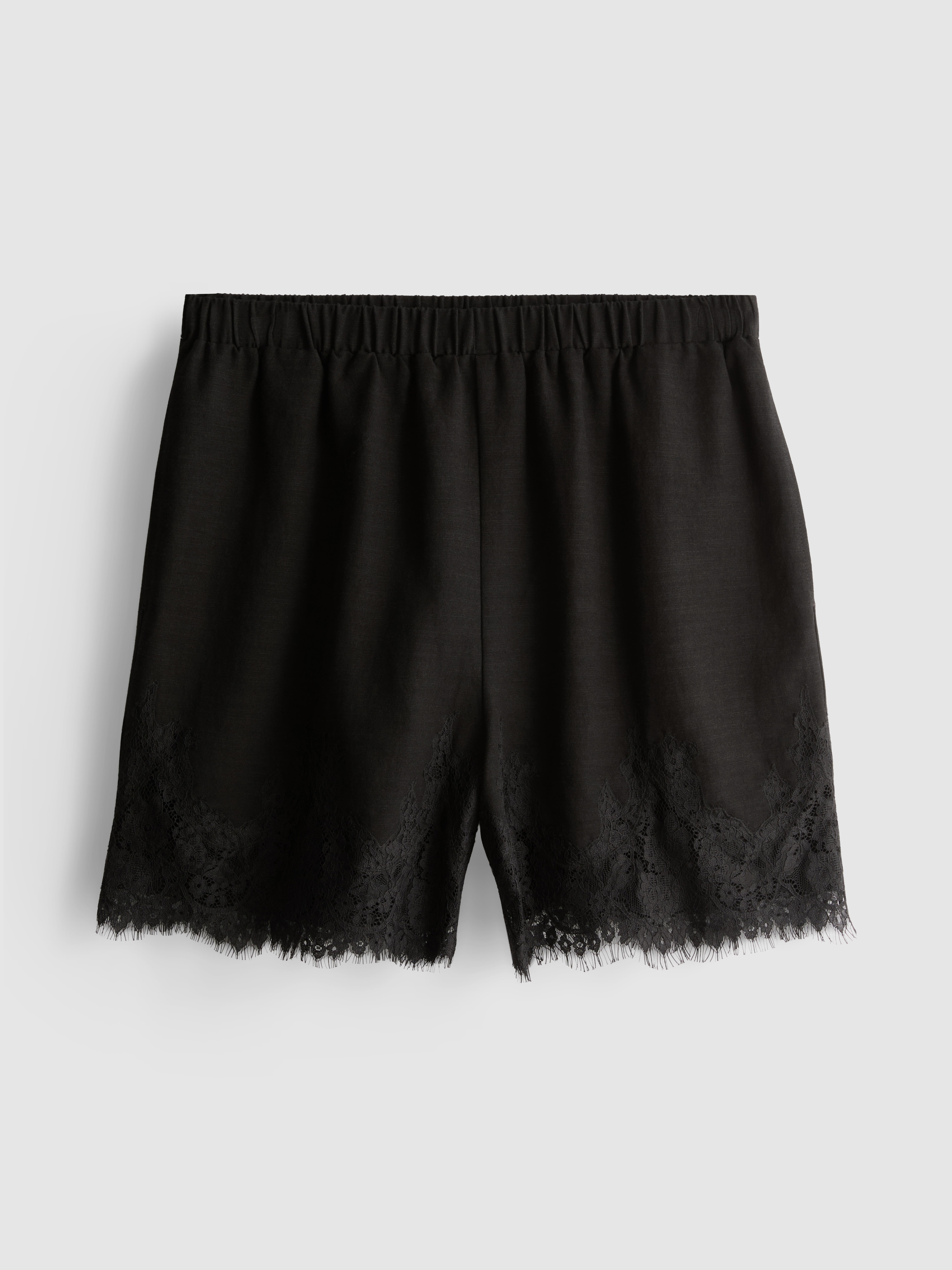 Pantalones cortos tejidos holgados con encaje
