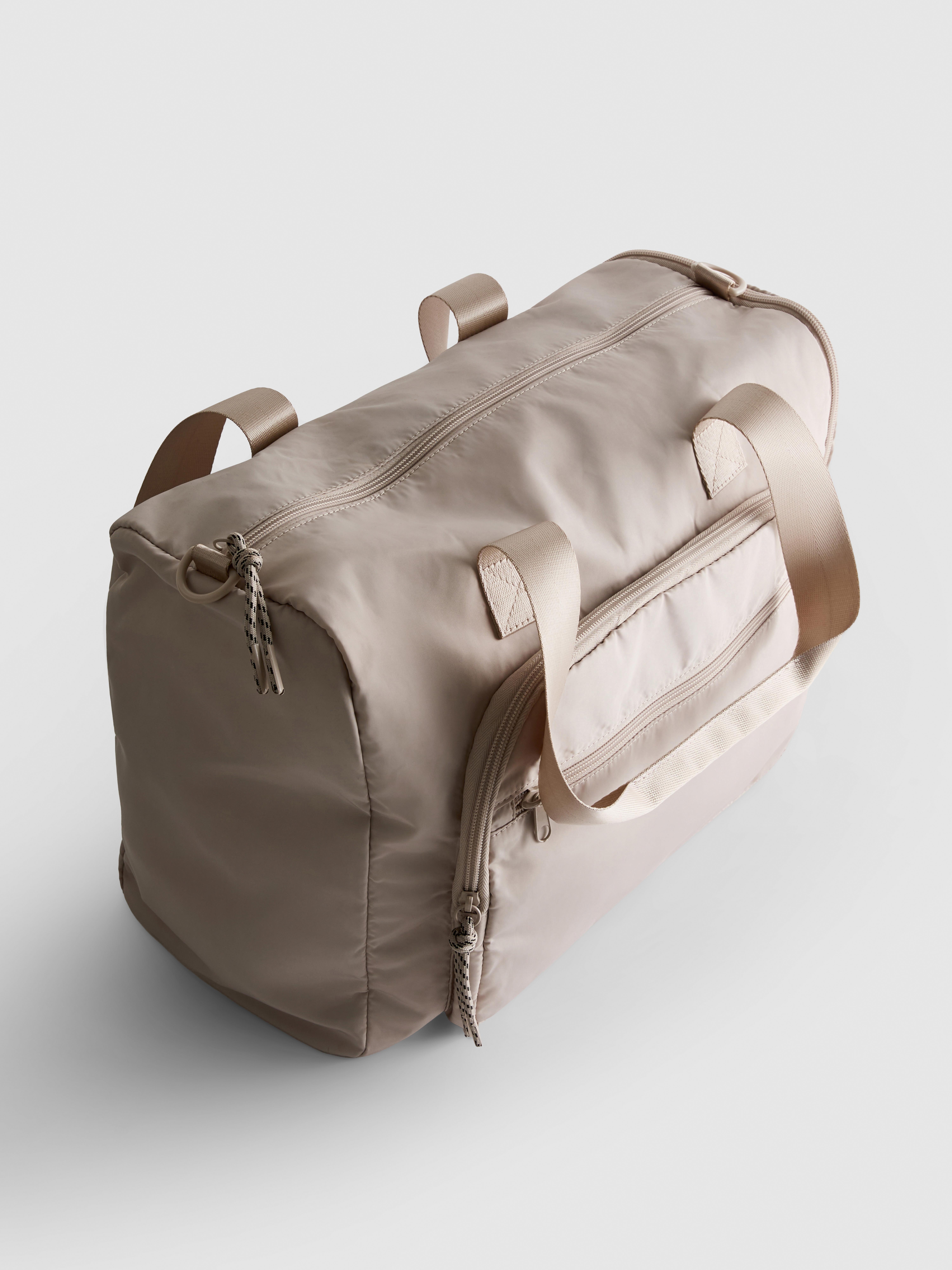 Borsone con zip multiple