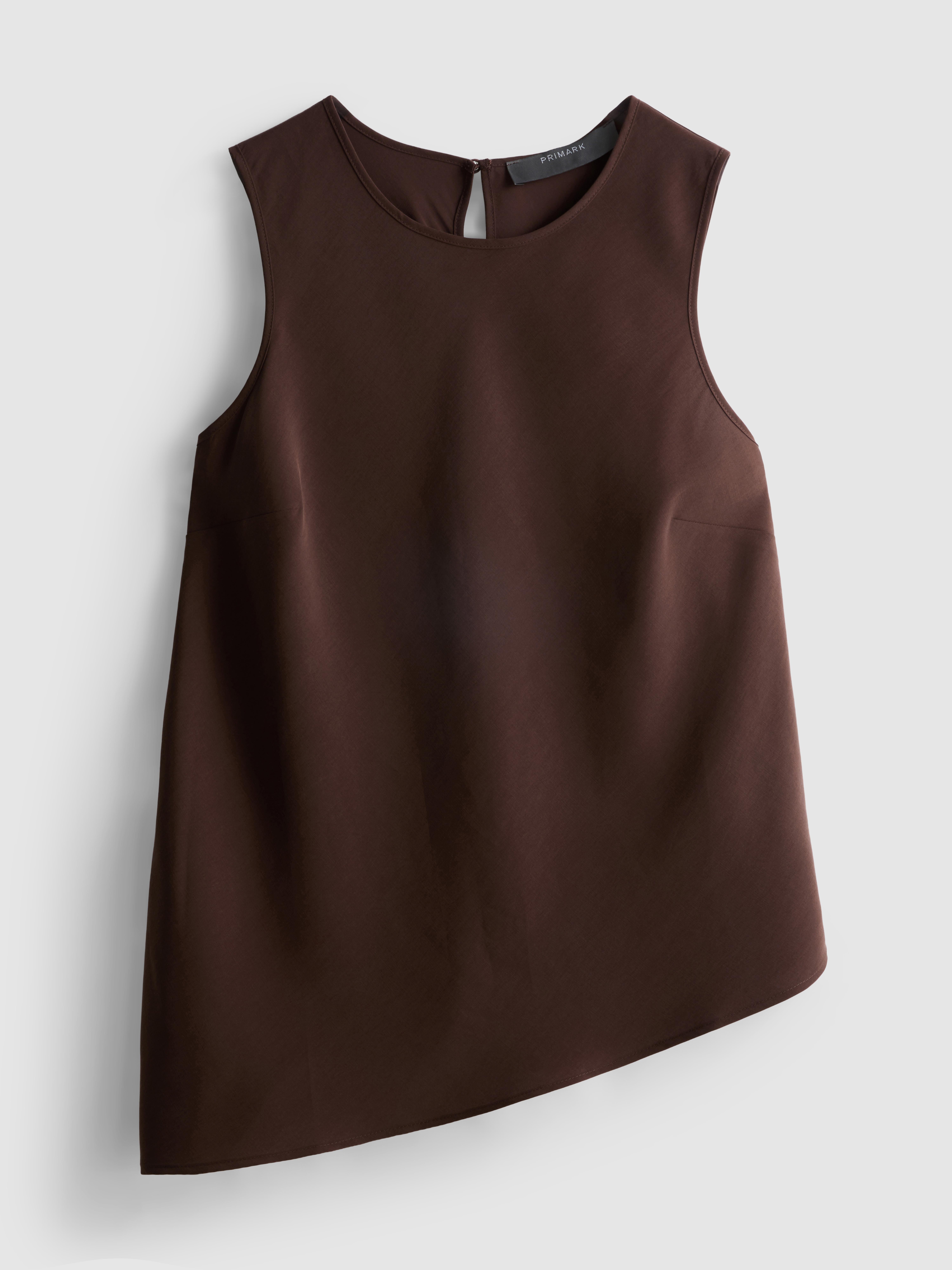 Soepelvallende top met asymmetrische zoom