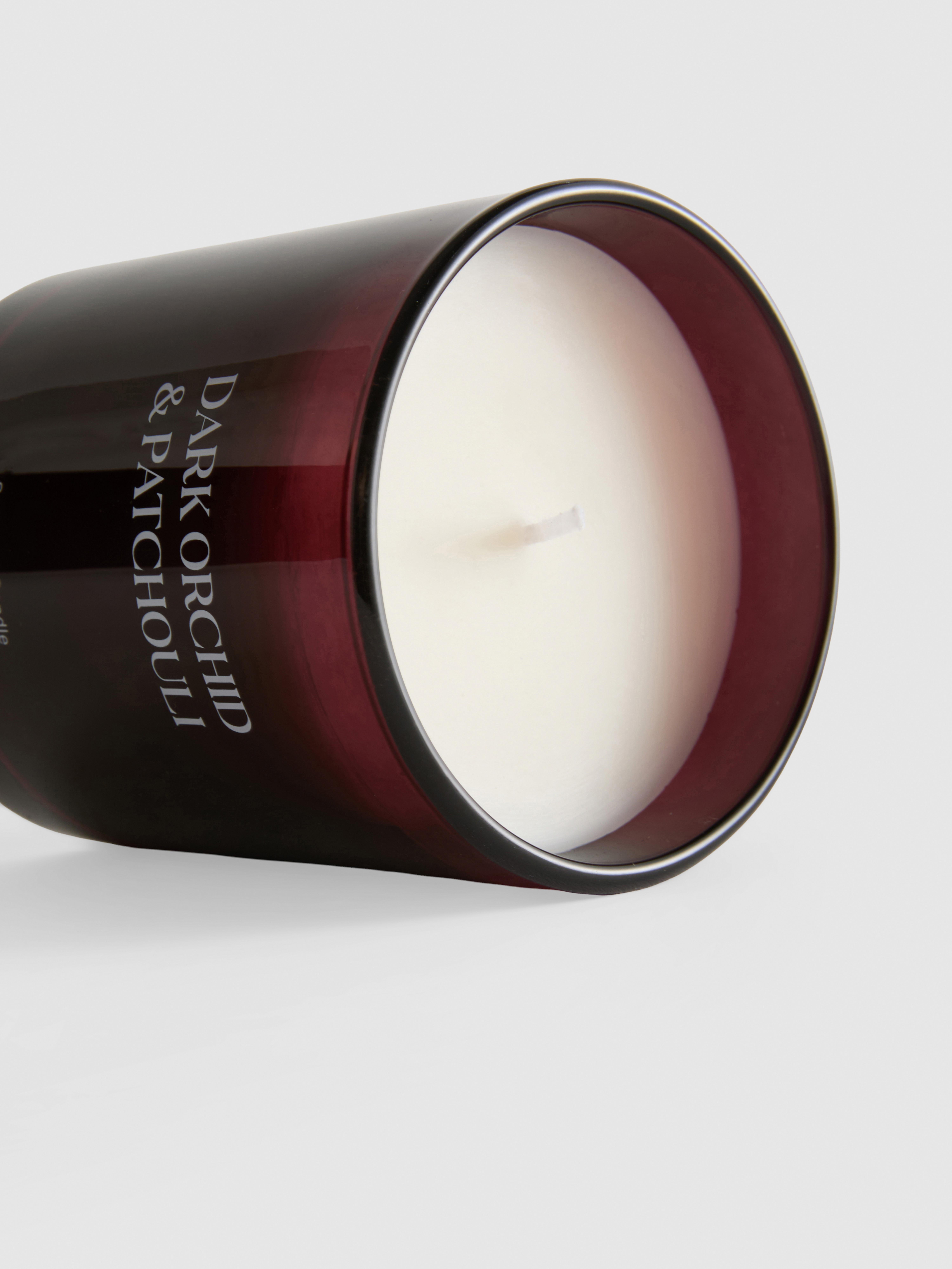 Bougie parfumée dans un pot en verre